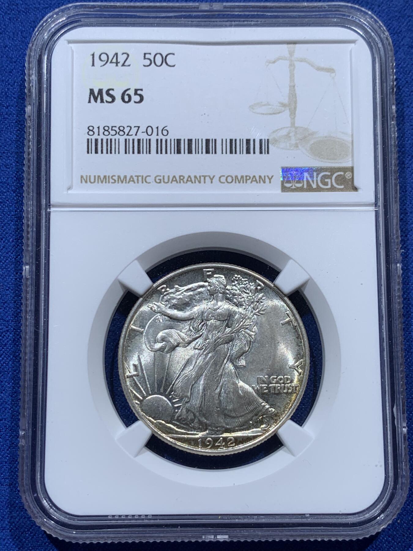 《竞宝斋》第347场 周日，周一，周二  3场连拍 （全场包邮） NGC MS65 美国1942年50分 ，行走女神银币，双面淡彩包浆，十分漂亮。高分原卷状态，适合自藏的一颗。