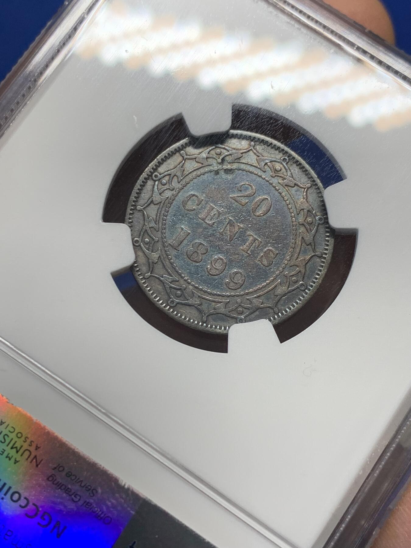《竞宝斋》第347场 周日，周一，周二  3场连拍 （全场包邮） NGC VF 纽芬兰1899年20分银币，稀见品种，少见小维头像。纽芬兰书价高，头像清晰的已颇有难度
