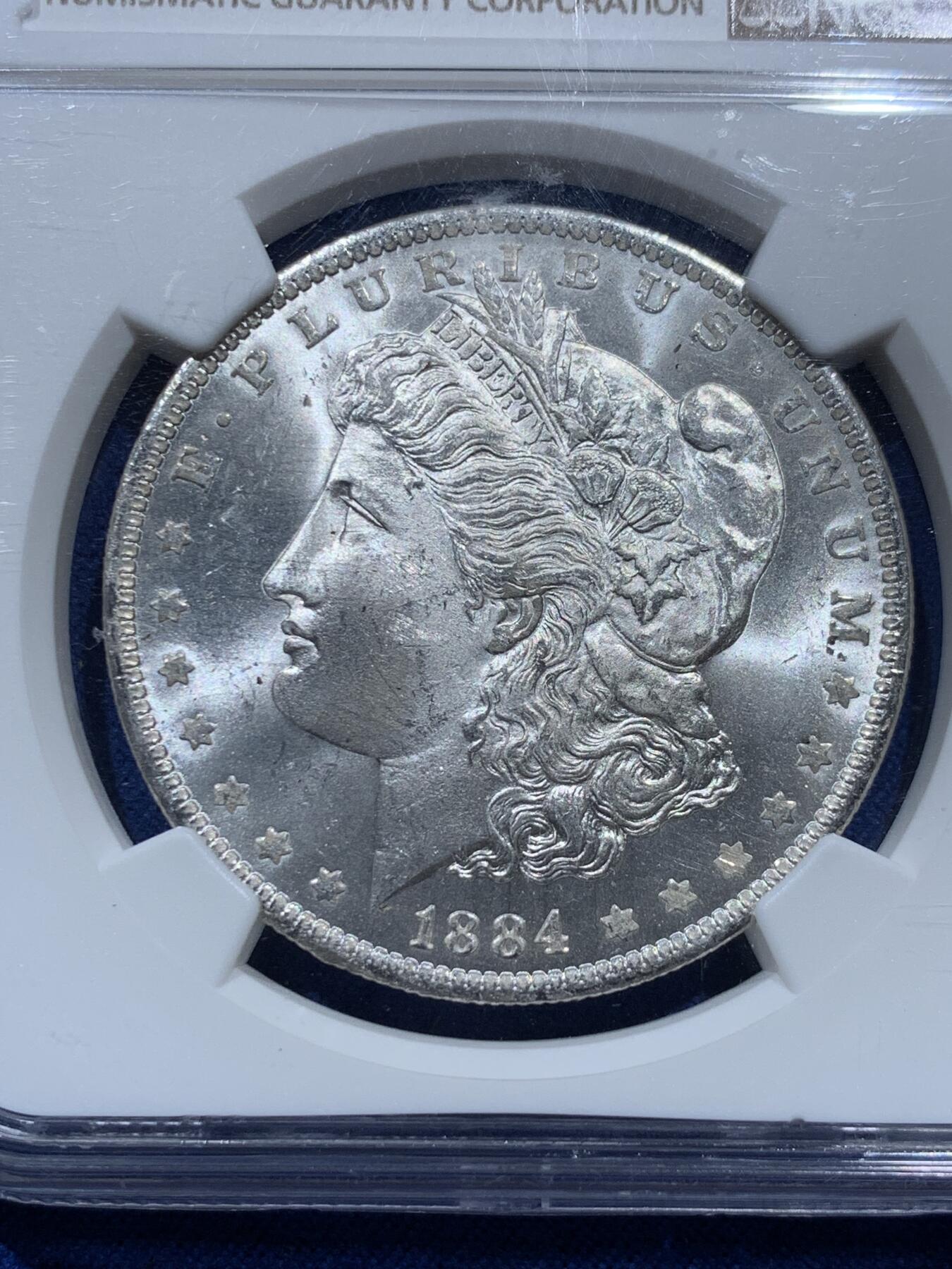 《竞宝斋》第347场 周日，周一，周二  3场连拍 （全场包邮） NGC MS63 美国 1884年 1美元摩根银币O厂