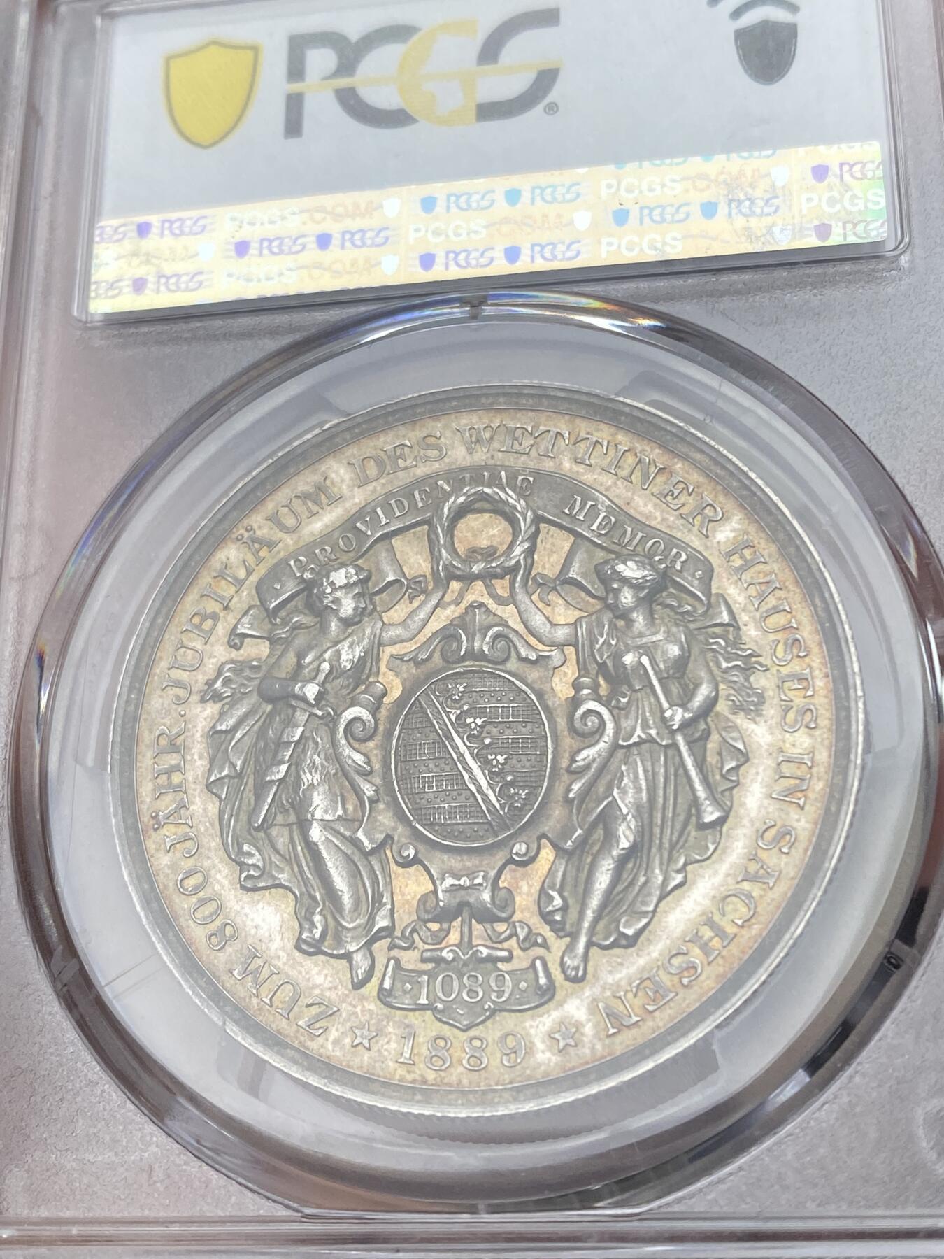 万国钱币拍卖第041期 PCGS SP62 1899年德国萨克森阿尔伯特纪念韦廷家族800周年银章 高浮雕双神守护萨克森盾徽 精美绝伦 38.35MM 20.3G