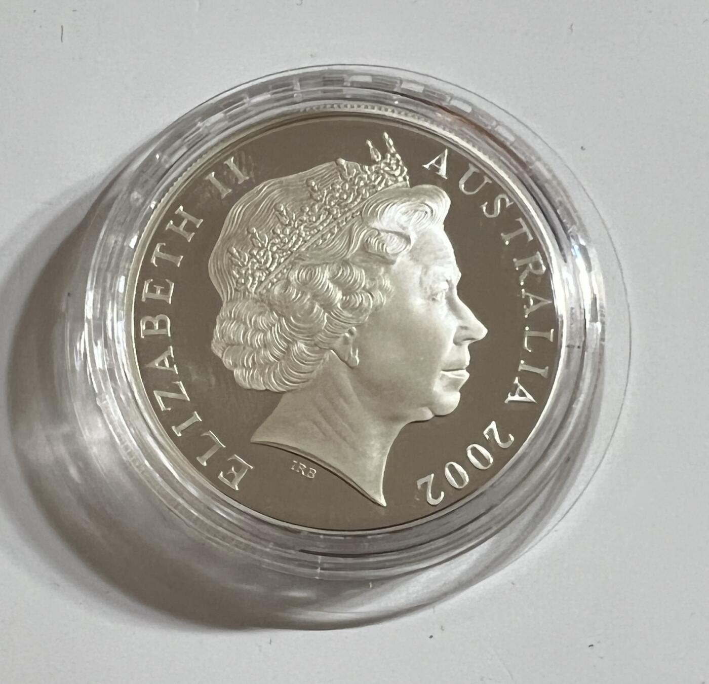 S&S Numismatic世界钱币-拍卖 第114期  澳大利亚2002年 墨尔本铸币局130周年 1澳元镶金精制银币 盒证齐全，31.1克999银+0.25克999金