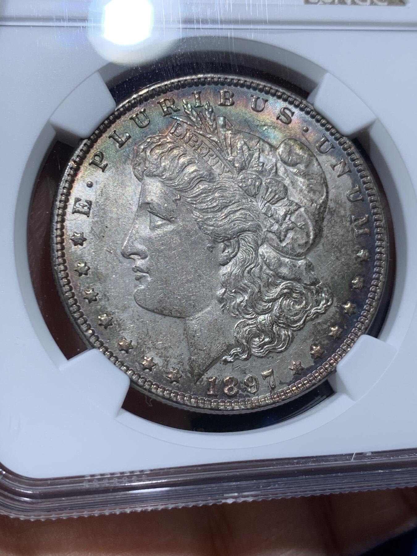 《竞宝斋》第347场 周日，周一，周二  3场连拍 （全场包邮） NGC MS62 美国1897年摩根银币  彩包浆  好味道