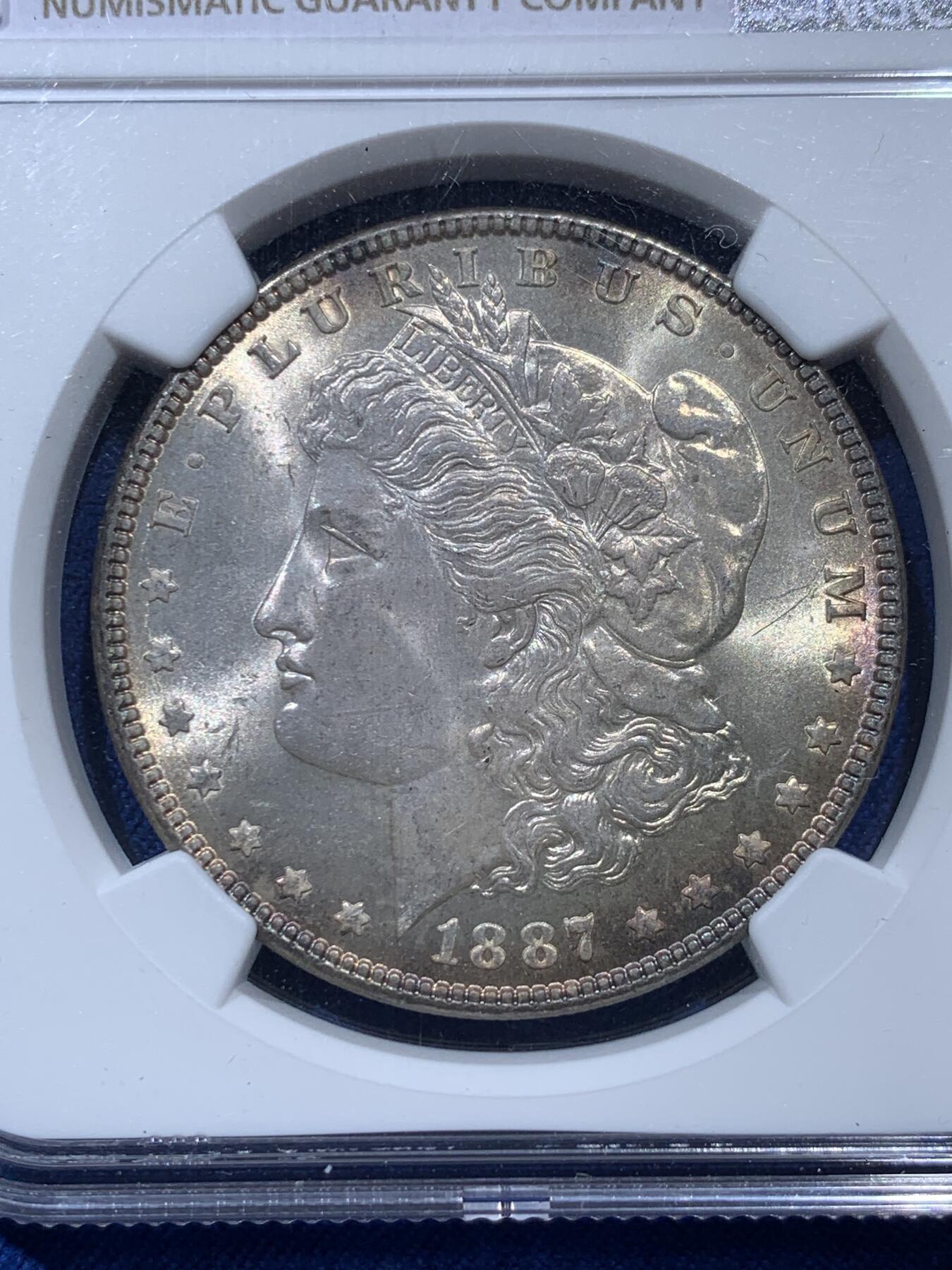 《竞宝斋》第347场 周日，周一，周二  3场连拍 （全场包邮） NGC MS64 美国1887年摩根银币  光度十足  淡彩包浆 细节精美 适合收藏
