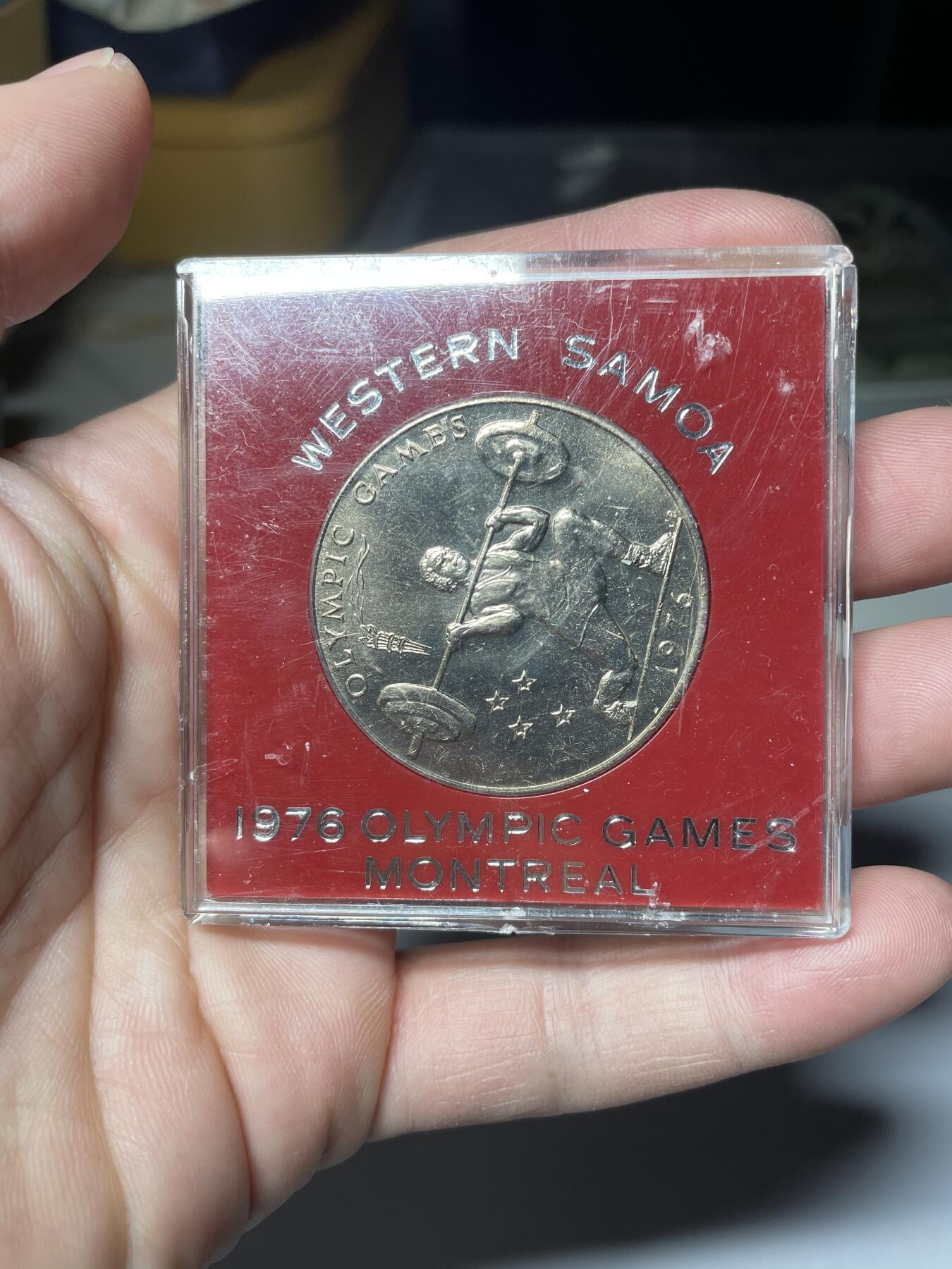 每日一拍，2025年集古藏今外币拍卖第一期-第5场—（总第195拍），可以寄存60天，满160元包邮。 萨摩亚1976年奥运会一元举重纪念币盒装