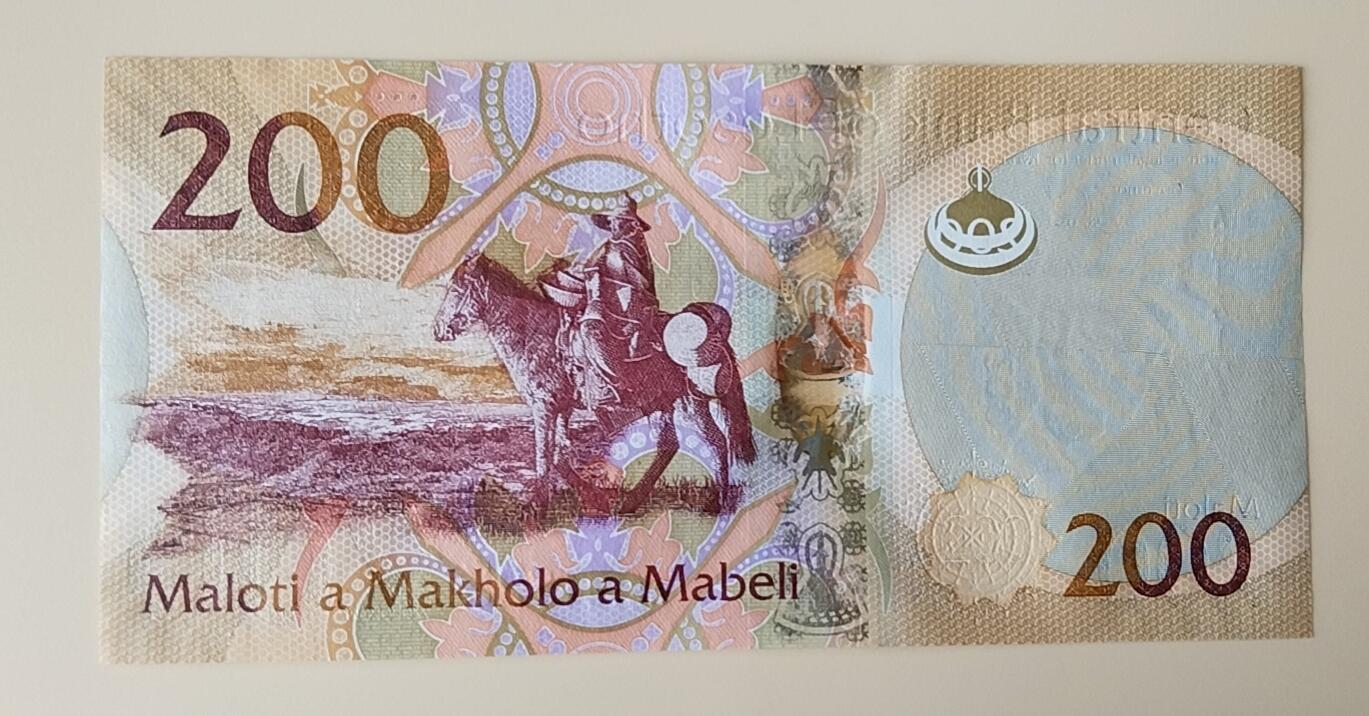 天和轩精品钱币第56场 全新UNC  莱索托200马洛蒂纸币