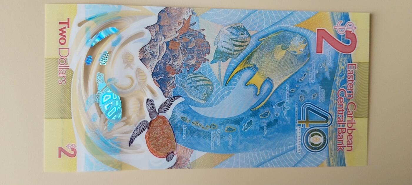 天和轩精品钱币第56场 全新UNC  东加勒比2塑料钞40周年纪念钞
