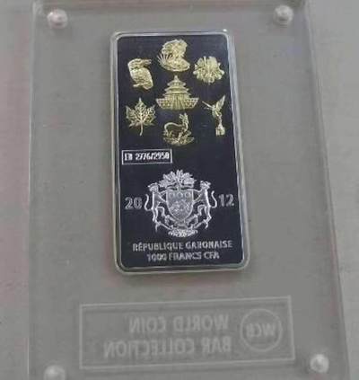 【币将精彩】世界钱币拍卖拍卖（2026-4-22） 加蓬各国投资币之熊猫币镀金方形银币  面值：1000法郎 材质：999银1盎司镀24K金 规格：66X32毫米 年份：2012 发行量：10000/欧洲版2950  瑞士瓦尔冈比造币厂铸造，原盒证书。