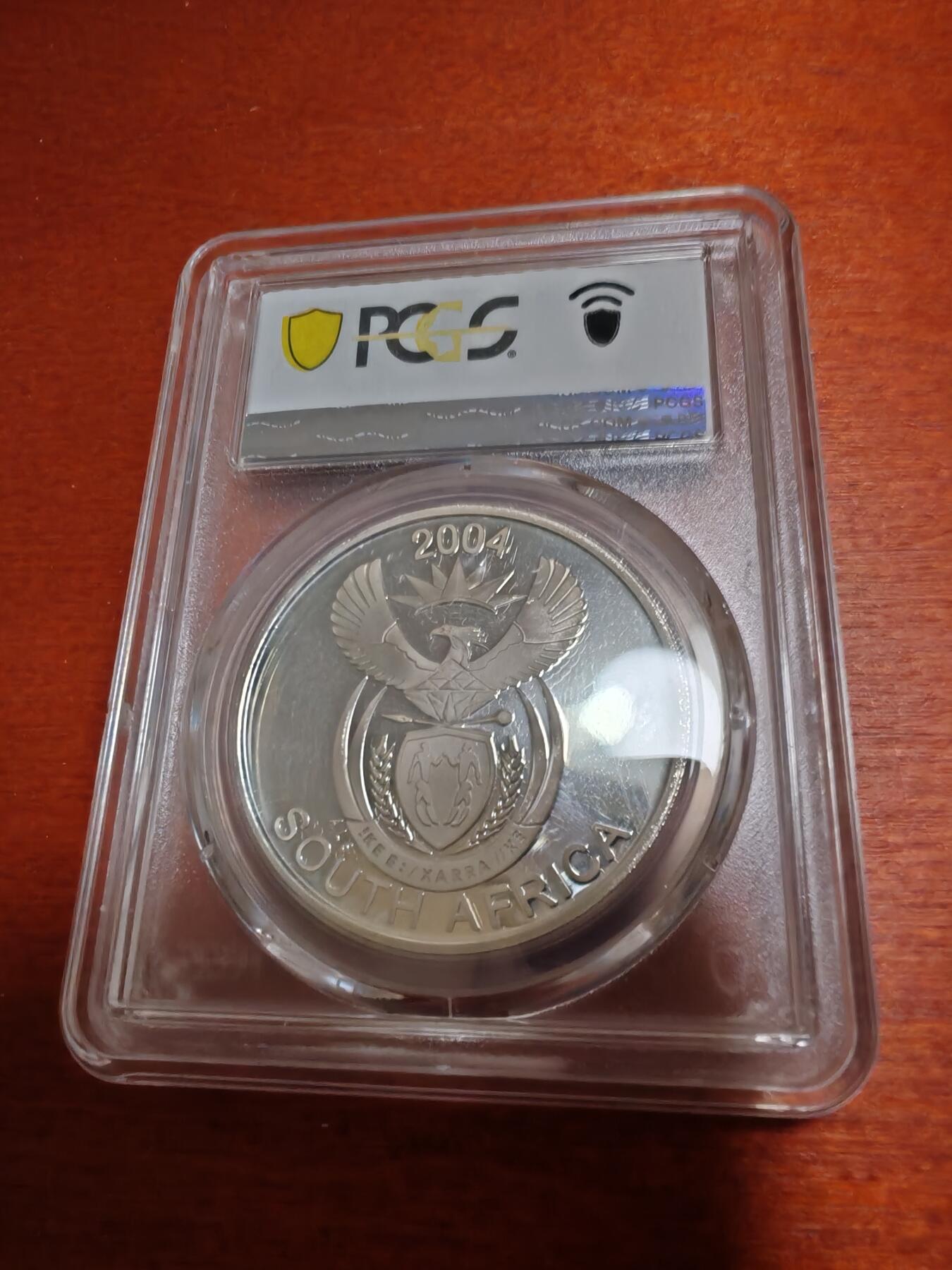 长老汇龙年精选第四十六场拍卖 2004南非豹子幼崽20分精制银币，PCGS PR68DCAM，唯一记录，1700多枚