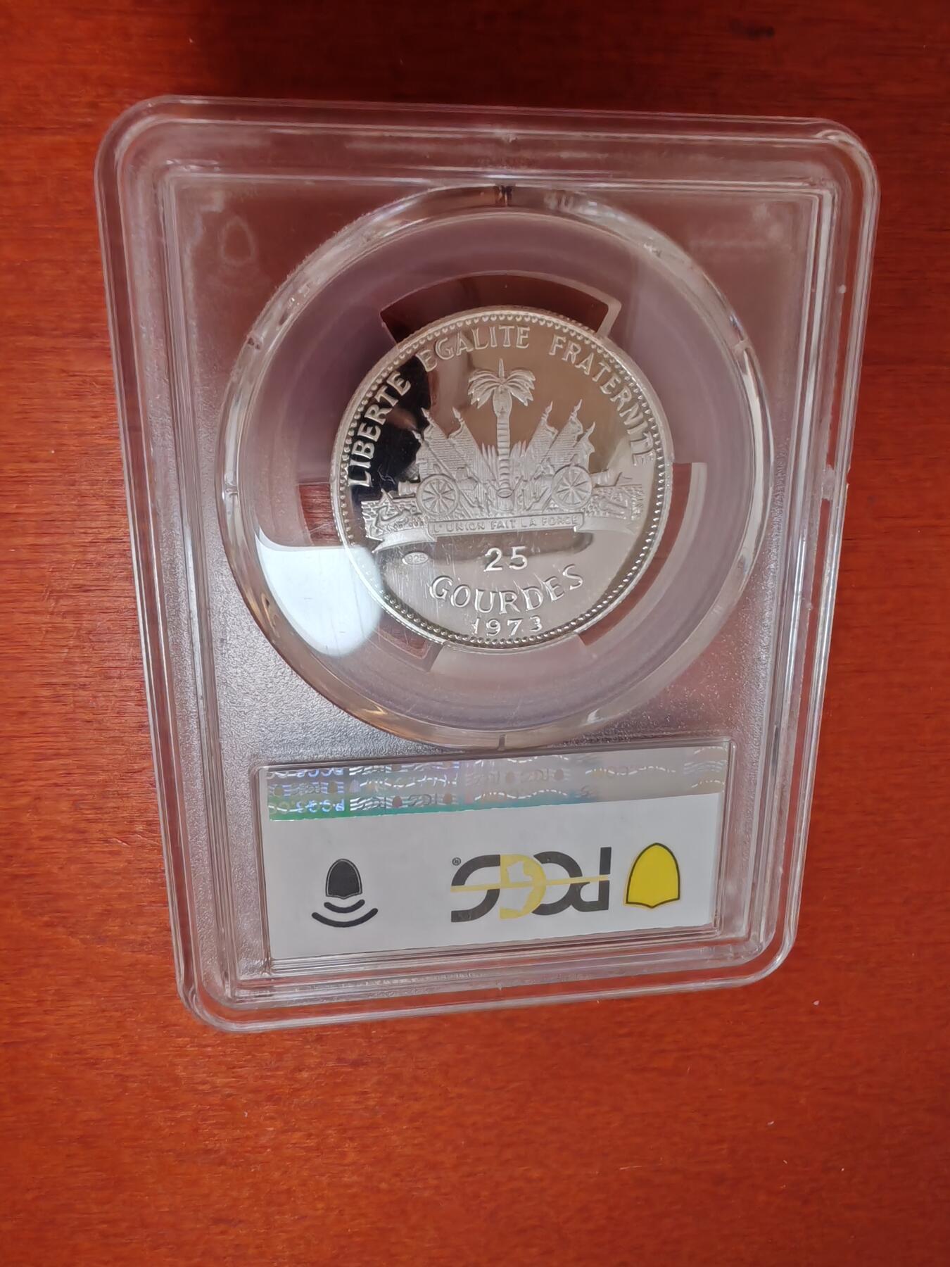 长老汇龙年精选第四十六场拍卖 1973海地哥伦布25古尔德精制银币，PCGS PR69DCAM，更高2枚，带原大钱包，5470枚