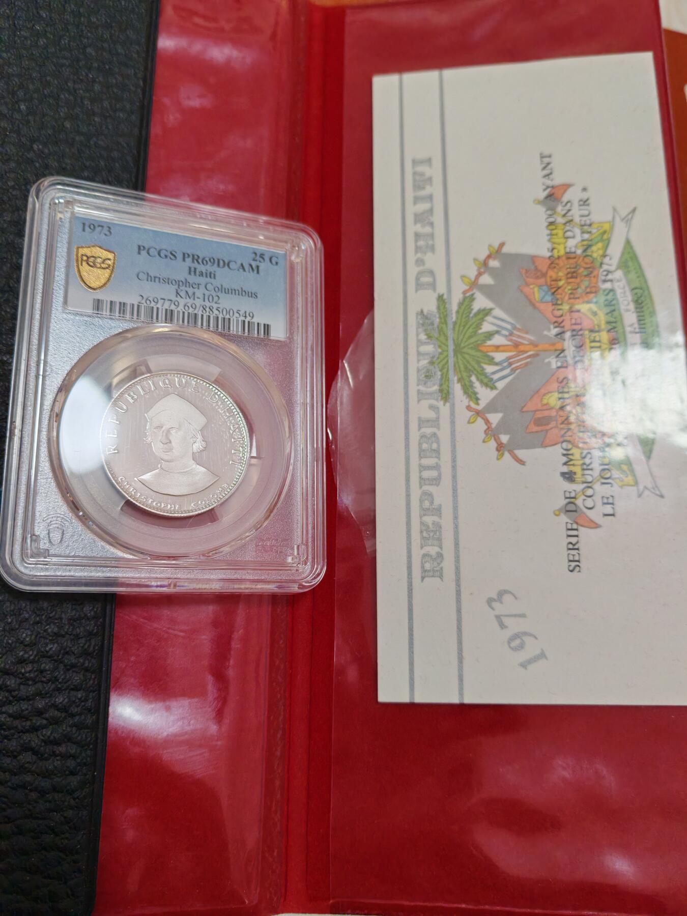 长老汇龙年精选第四十六场拍卖 1973海地哥伦布25古尔德精制银币，PCGS PR69DCAM，更高2枚，带原大钱包，5470枚