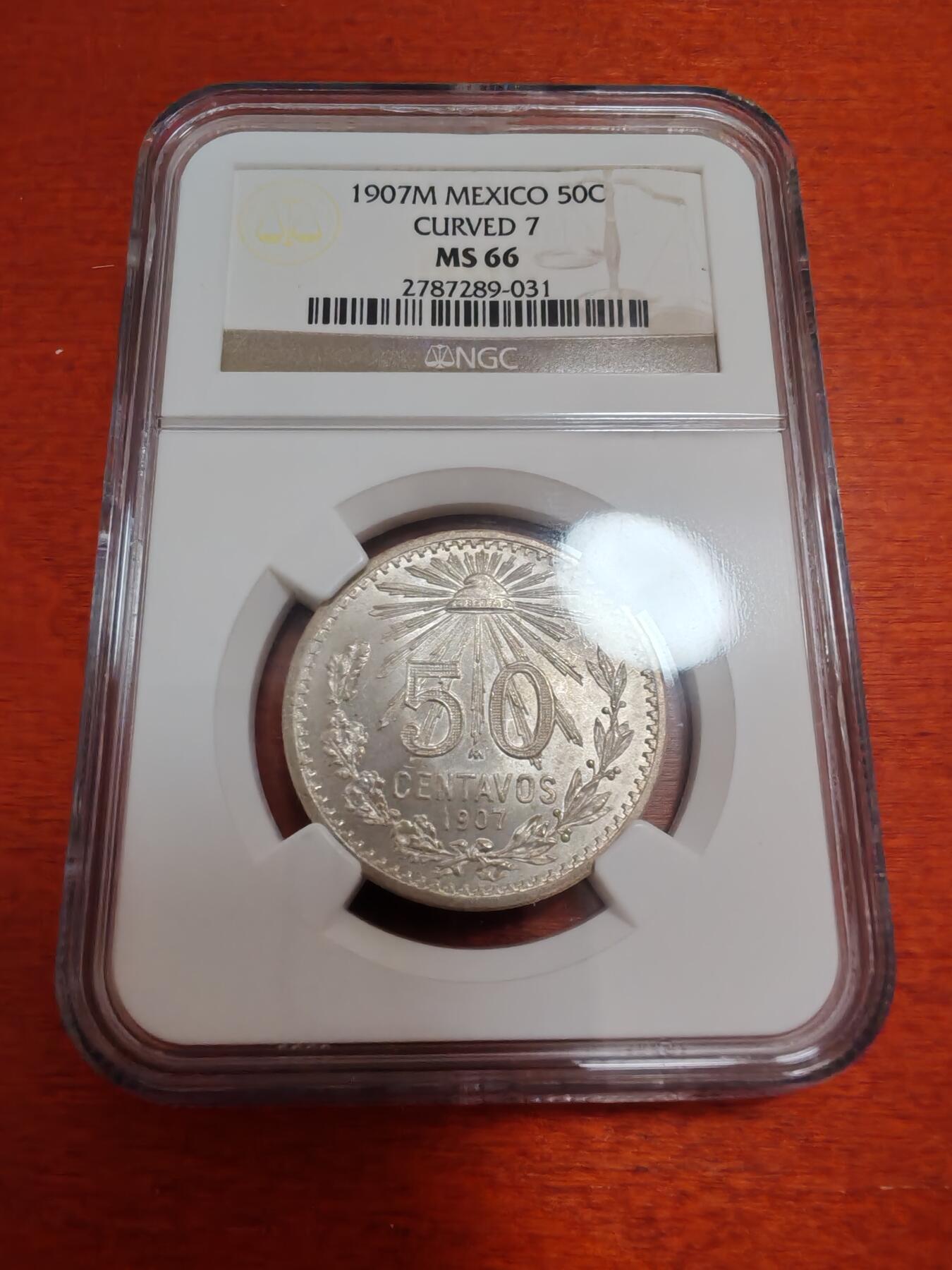 长老汇龙年精选第四十七场拍卖 1907墨西哥自由帽鹰洋50分银币，NGC MS66，版本数字7弯曲，冠军分