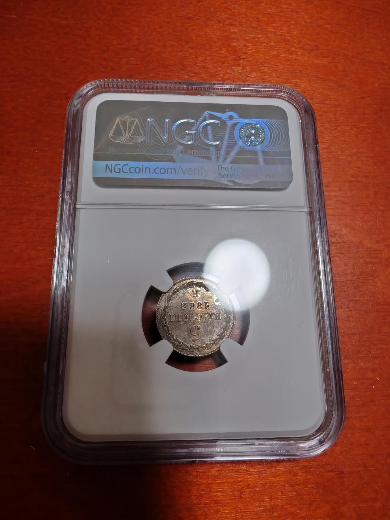 长老汇龙年精选第四十九场拍卖 1862R XVII 意大利教皇国 5B银币，NGC MS64分，唯一冠军分，远远领先第二名53分，克书XF40标价150美金，镜面感十足