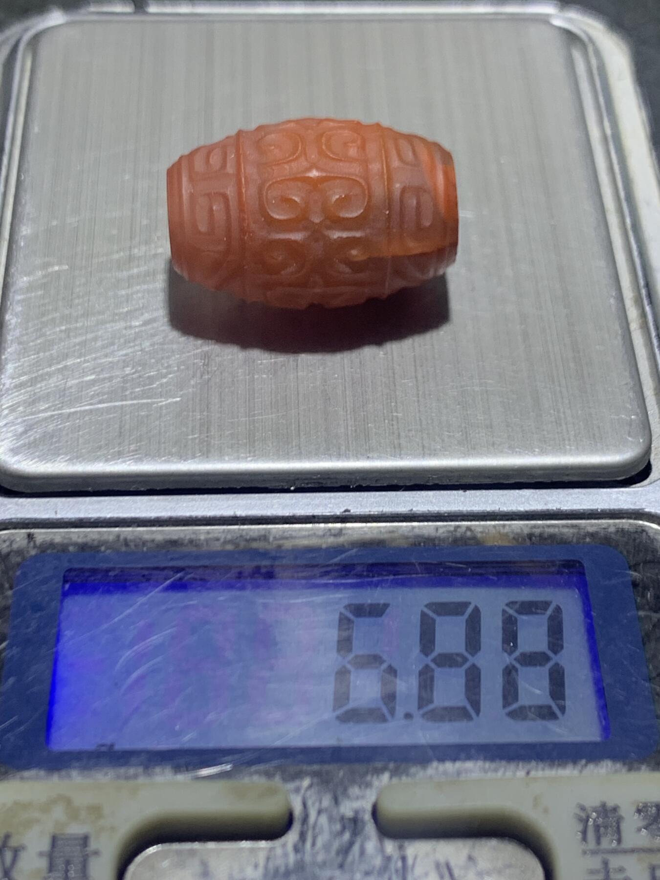 精美川料亚光南红玛瑙雕刻回纹桶珠一个
