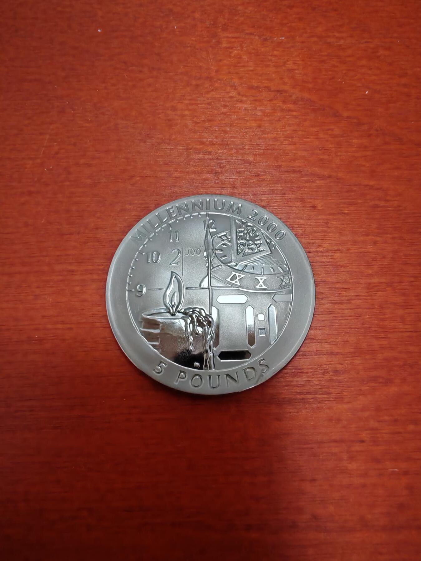 长老汇龙年精选第五十场拍卖 1999直布罗陀千禧年5镑钛合金币，克书85美金