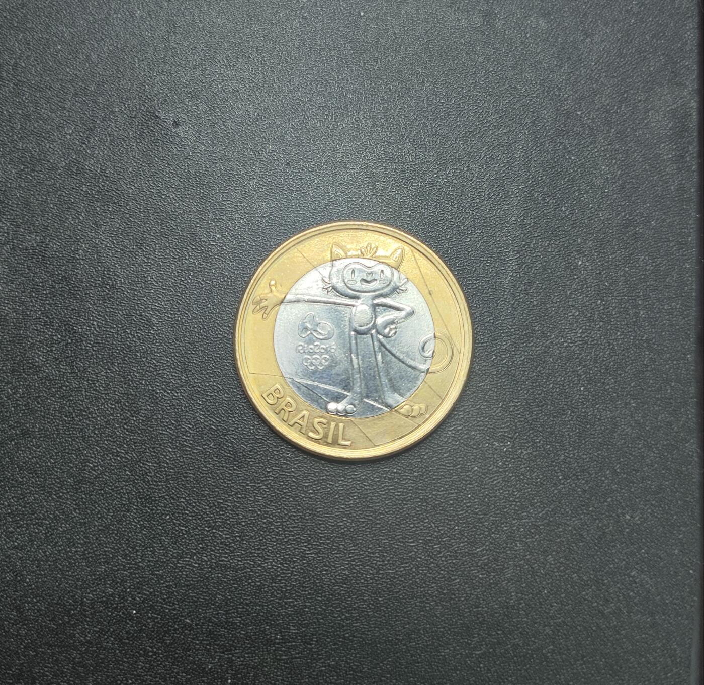 新时代收藏徽章红藏拍卖(第九场) 奥运会纪念币 巴西奥运会 一里拉纪念币 上面有吉祥物