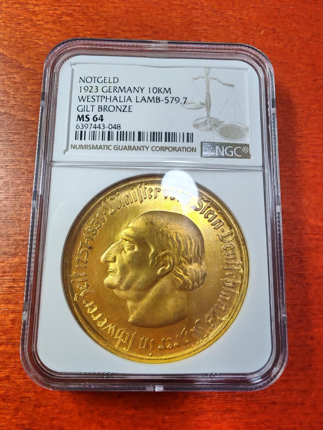 长老汇蛇年精选第一场拍卖 1923德紧威斯特伐利亚斯坦伯爵马币1万马克镀金币，NGC MS64，窄边