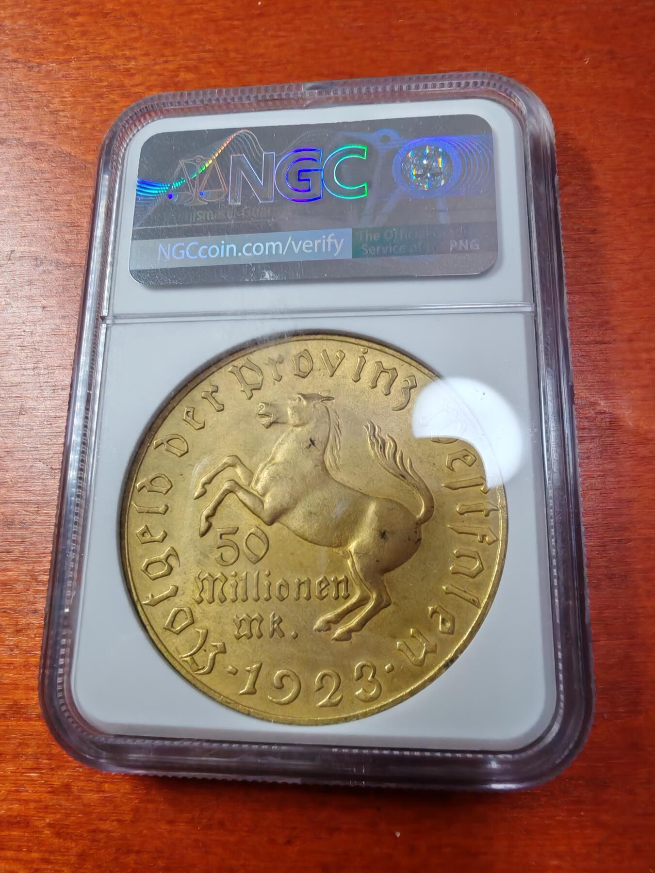 长老汇蛇年精选第一场拍卖 1923德紧威斯特伐利亚斯坦伯爵马币1万马克镀金币，NGC MS65，宽边