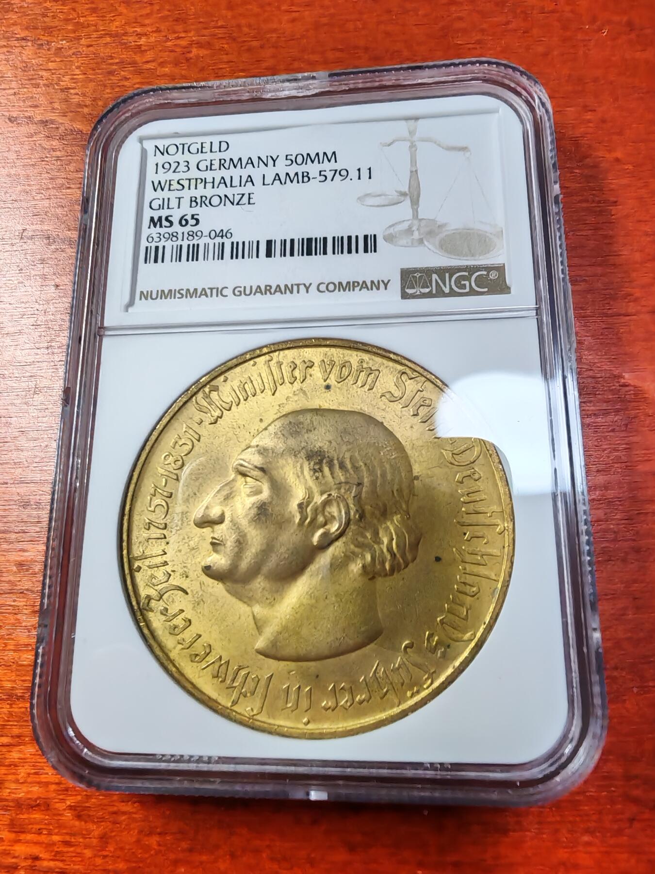 长老汇蛇年精选第一场拍卖 1923德紧威斯特伐利亚斯坦伯爵马币1万马克镀金币，NGC MS65，宽边