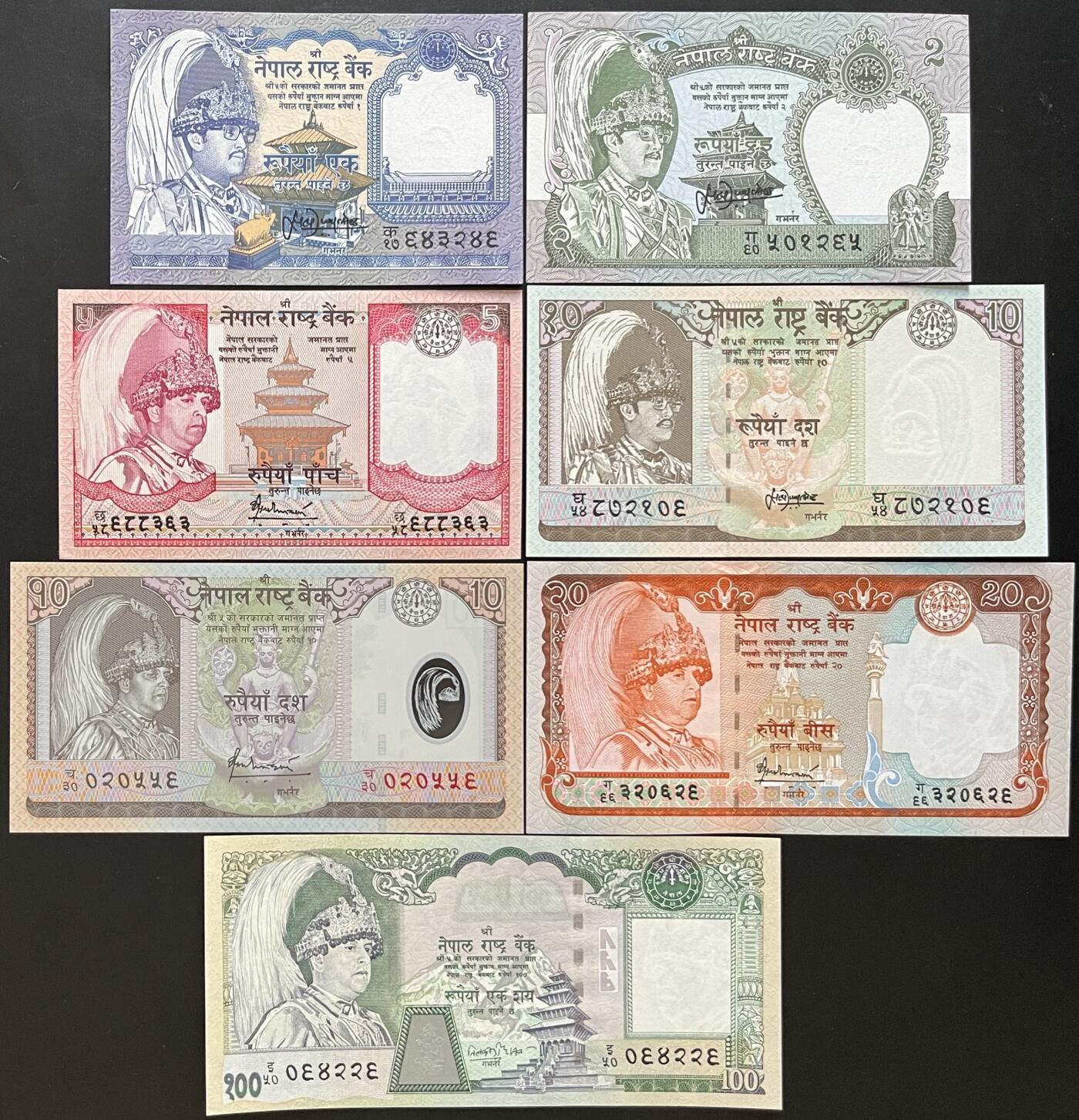 小福收藏拍卖第181期 裸钞场 本期有多张豹子号靓号  菲律宾100000比索限量珍稀超大纪念钞 广东省银行31年10元银毫券  马来西亚首发AA冠全同号大全套 日本 法国 西班牙 玻利维亚 立陶宛 斯洛伐克等多国精美纸币 尼泊尔 1981-2001年 1 2 5 10 20 100卢比 +2005年 10卢比 塑料钞 7张套 unc
