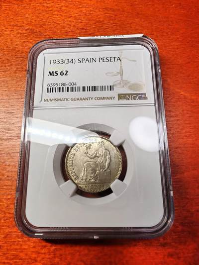 长老汇马年精选第四场拍卖 - 1933西班牙共和国拿花1比塞塔银币，NGC MS62