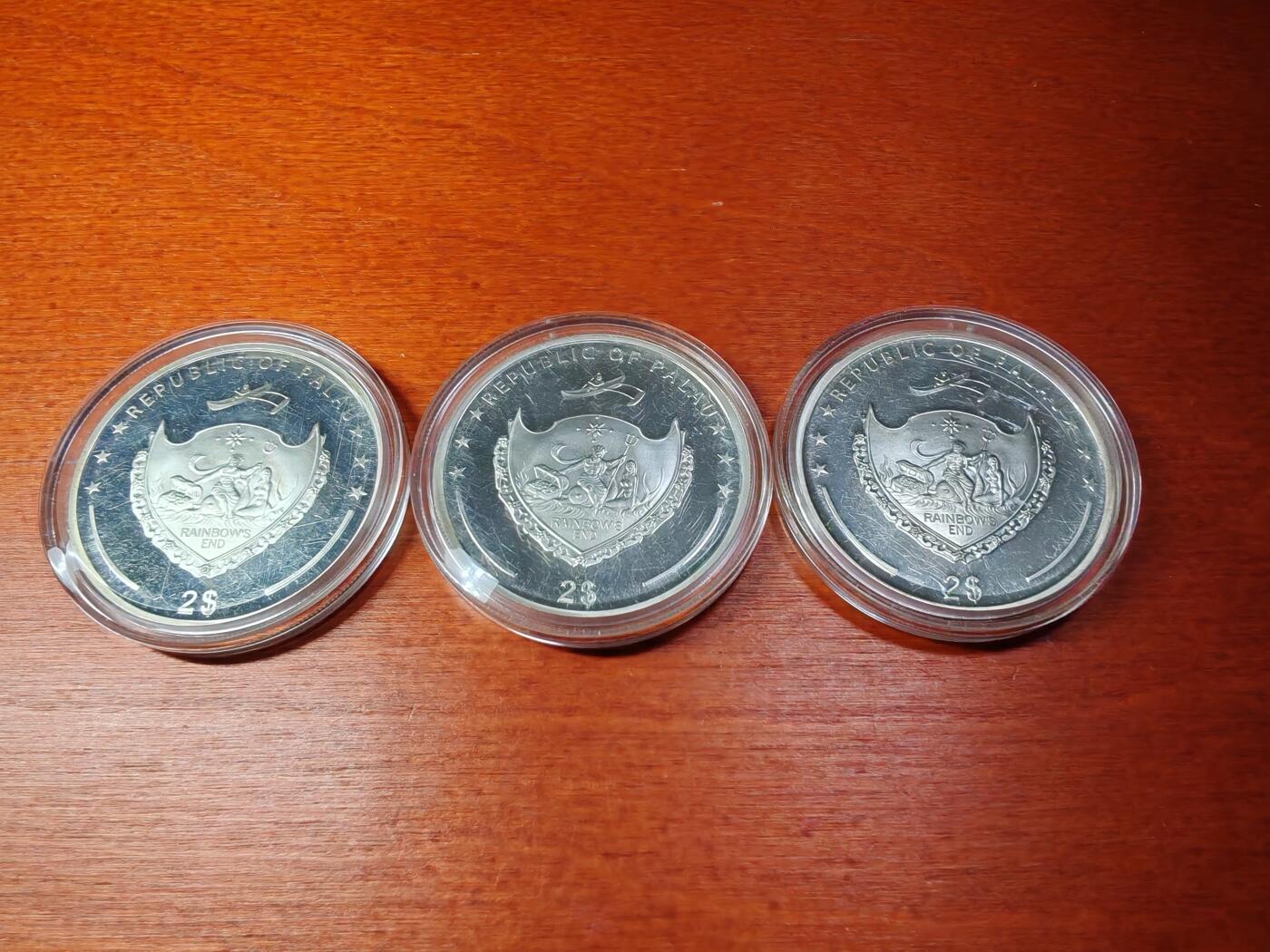 长老汇蛇年精选第二场拍卖 2011帕劳蛙类动物2元彩色精制银币，3枚套，500套，本月麦稀奇成交价726元