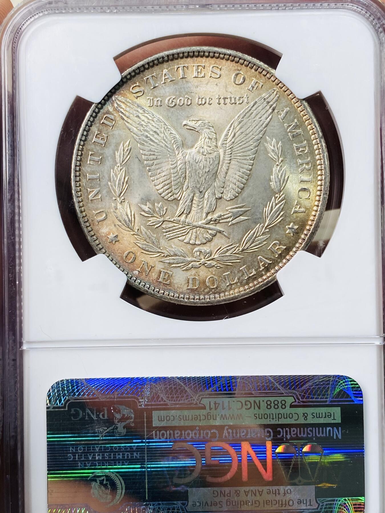 万国钱币拍卖第042期（蛇年首拍） NGC MS64 1898年美国摩根1元大银币 五彩倒影包浆极致体验