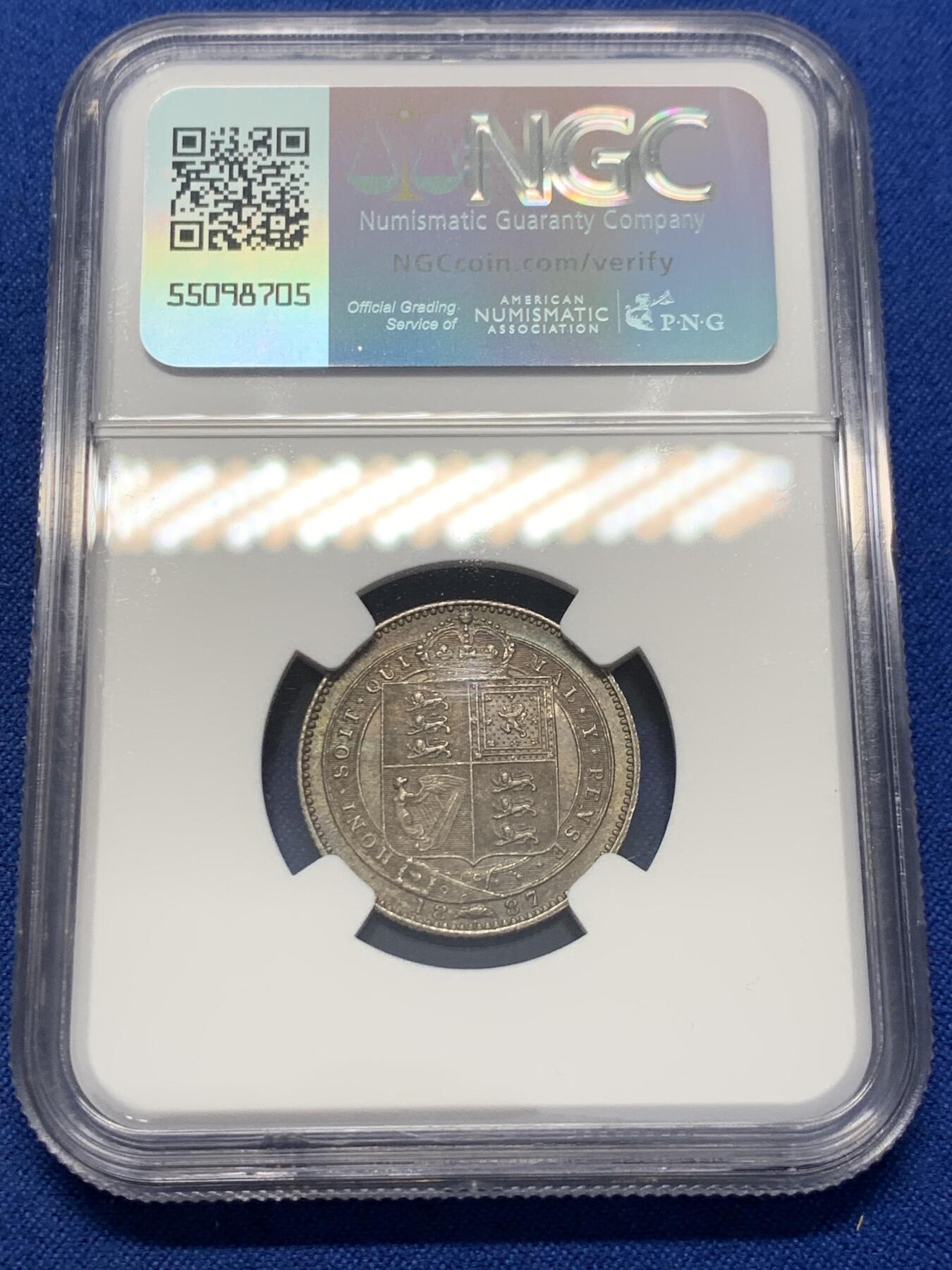 《竞宝斋》第351场 周日，周一 2场连拍 （全场包邮） NGC MS61 英国1887年维多利亚女王1先令银币 冷色调紫绿包浆 非常具有视觉美感 来自鲍德温父子的保险库，这批集藏在地下室被储存了超过一个世纪。