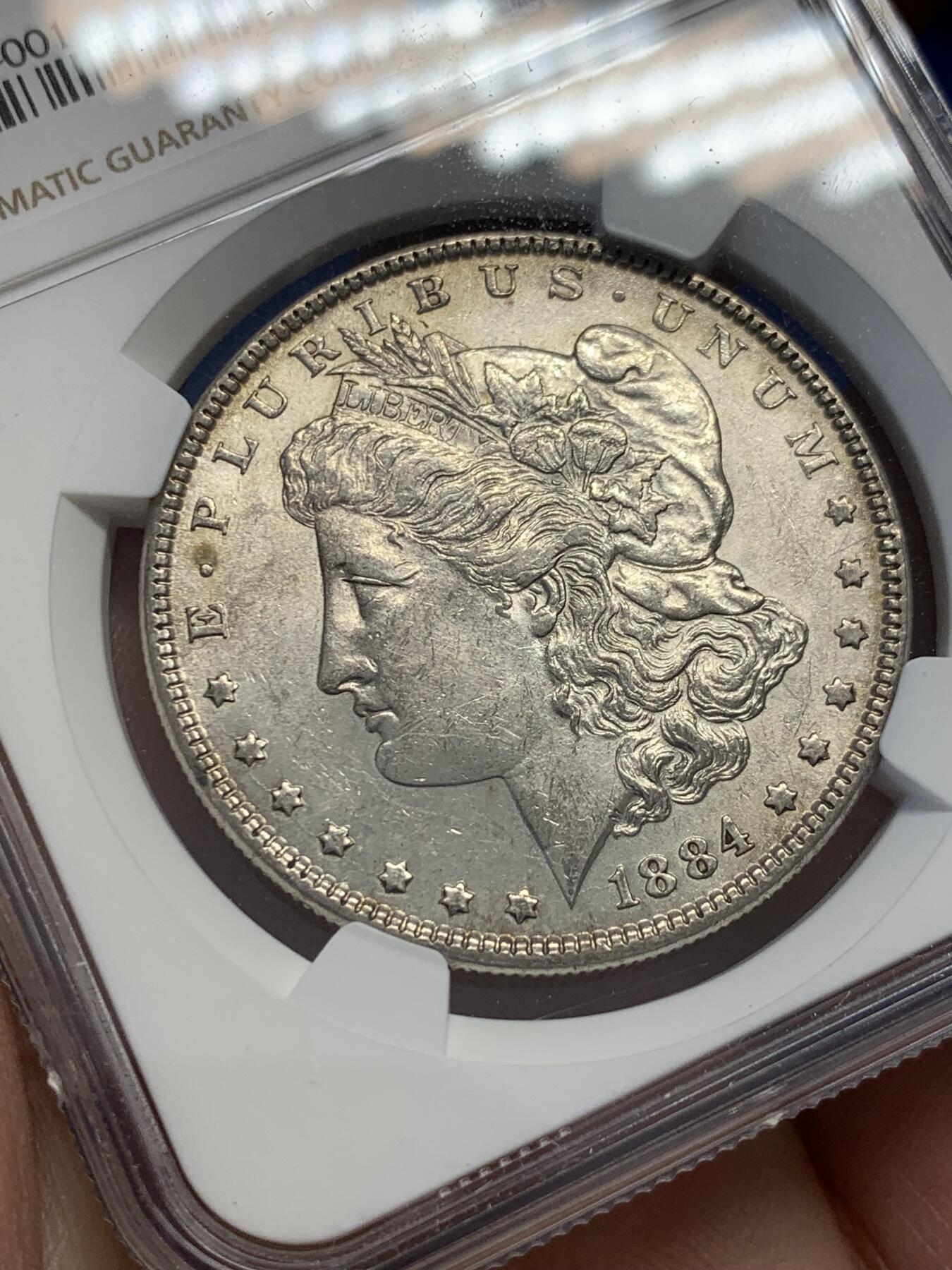《竞宝斋》第351场 周日，周一 2场连拍 （全场包邮） NGC MS61 美国1884年摩根1美圆银币