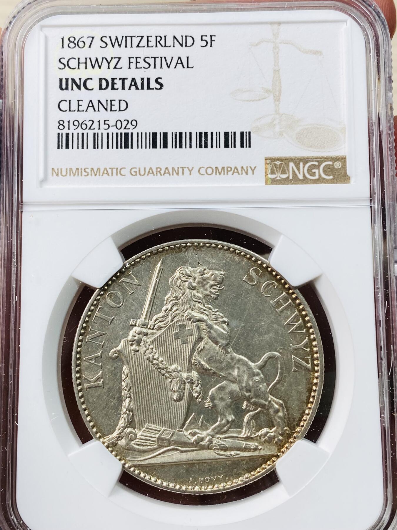 万国钱币拍卖第042期（蛇年首拍） NGC UNCD 1867年瑞士施维茨5法郎大银 瑞射名誉品种 深打淡金彩
