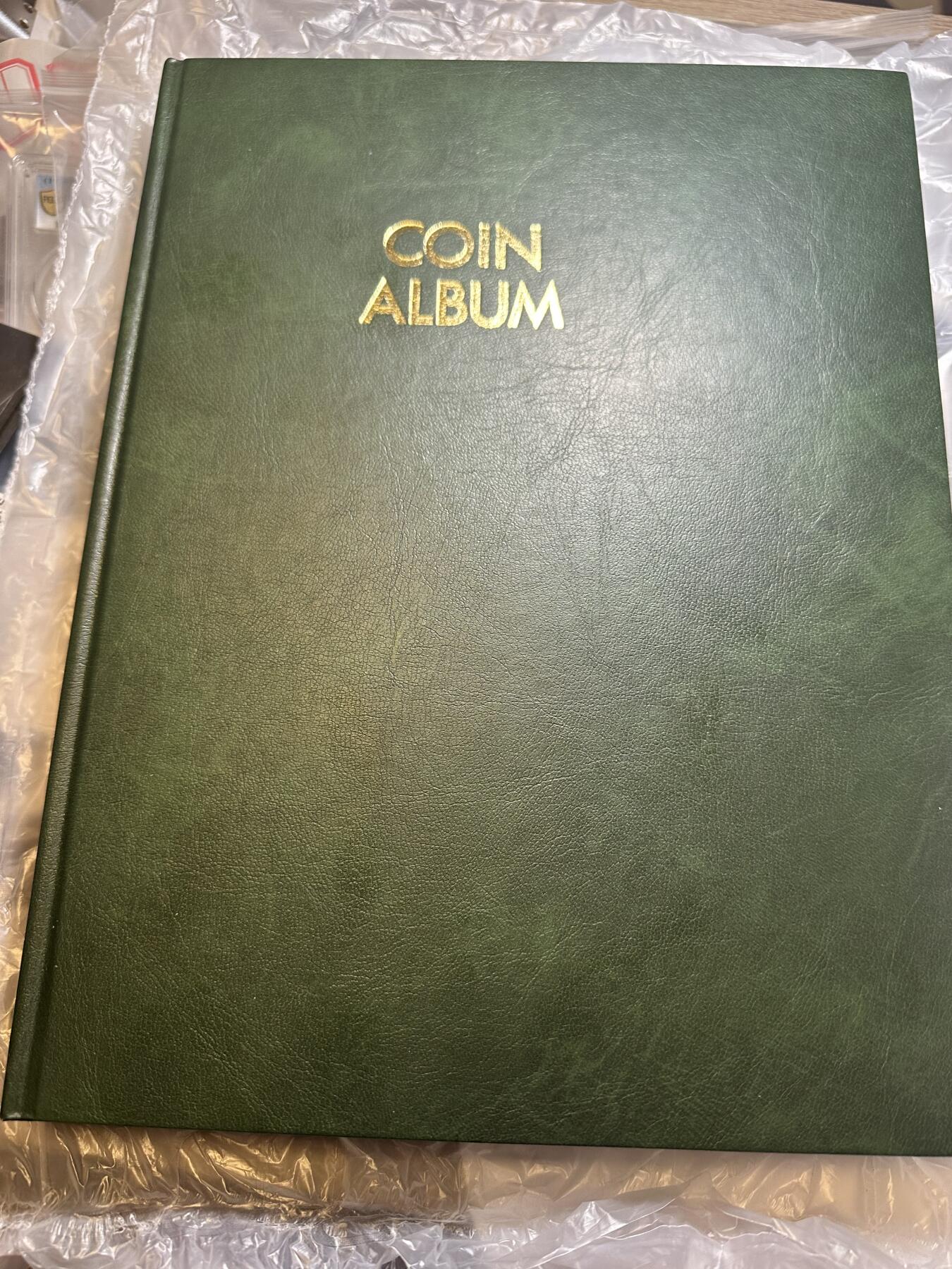 世界钱币，章，大清铜币，光绪元宝，乾隆通宝，邮折，明信片 进口高级专业收藏钱币册！硬皮革！28*21cm，每页12枚，5页，可以放60个币 仅此一个