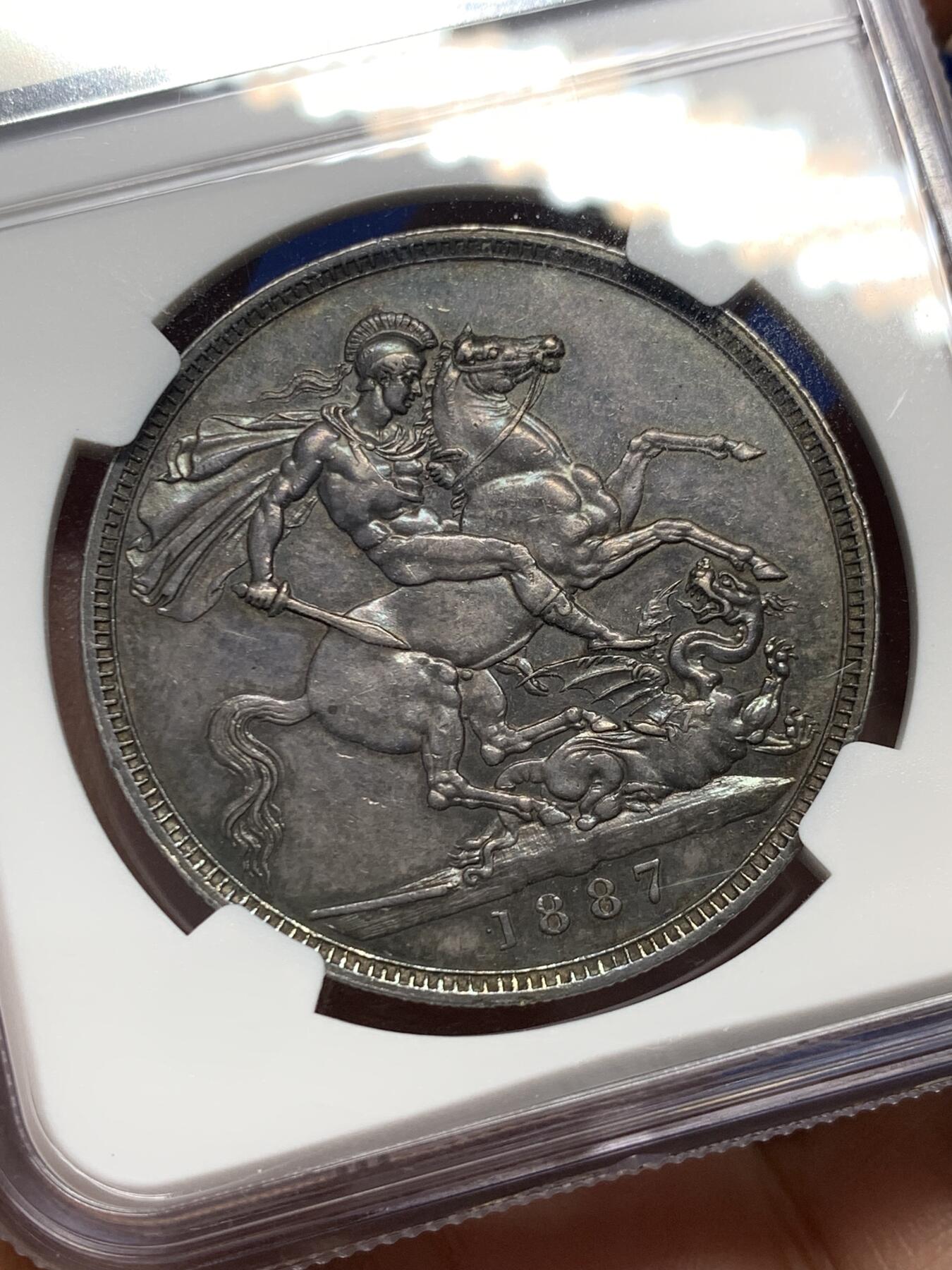 《竞宝斋》第352场 周日，周一 2场连拍 （全场包邮） NGC AUD 英国1887年高冠马剑1克朗银币