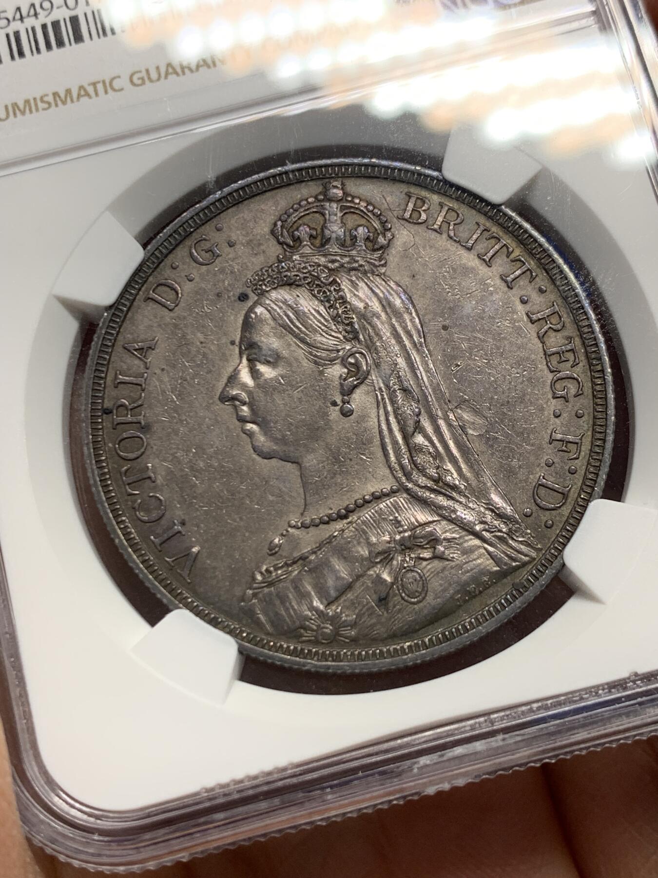 《竞宝斋》第352场 周日，周一 2场连拍 （全场包邮） NGC AUD 英国1887年高冠马剑1克朗银币
