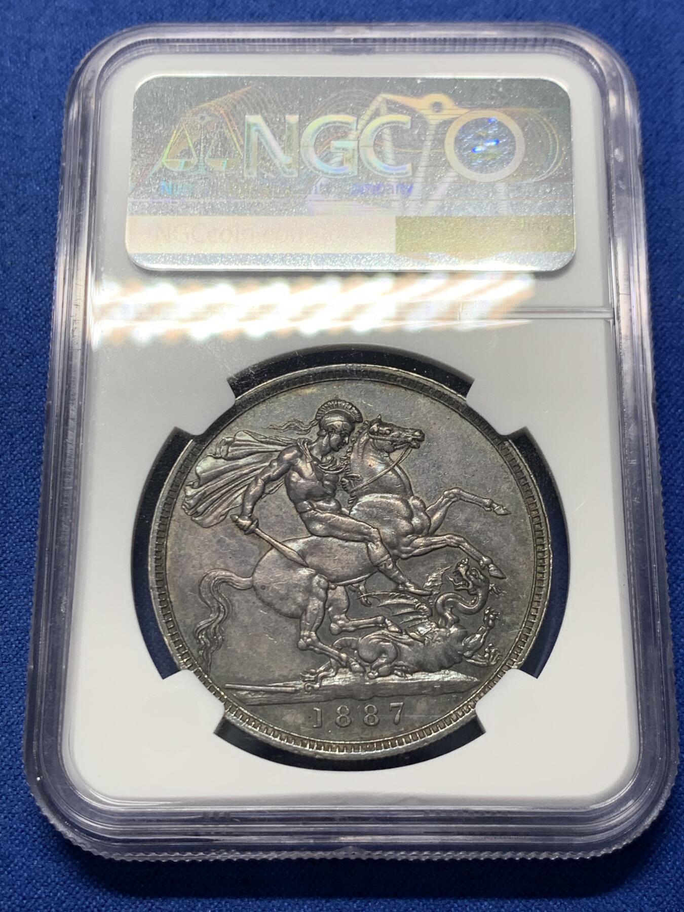 《竞宝斋》第352场 周日，周一 2场连拍 （全场包邮） NGC AUD 英国1887年高冠马剑1克朗银币