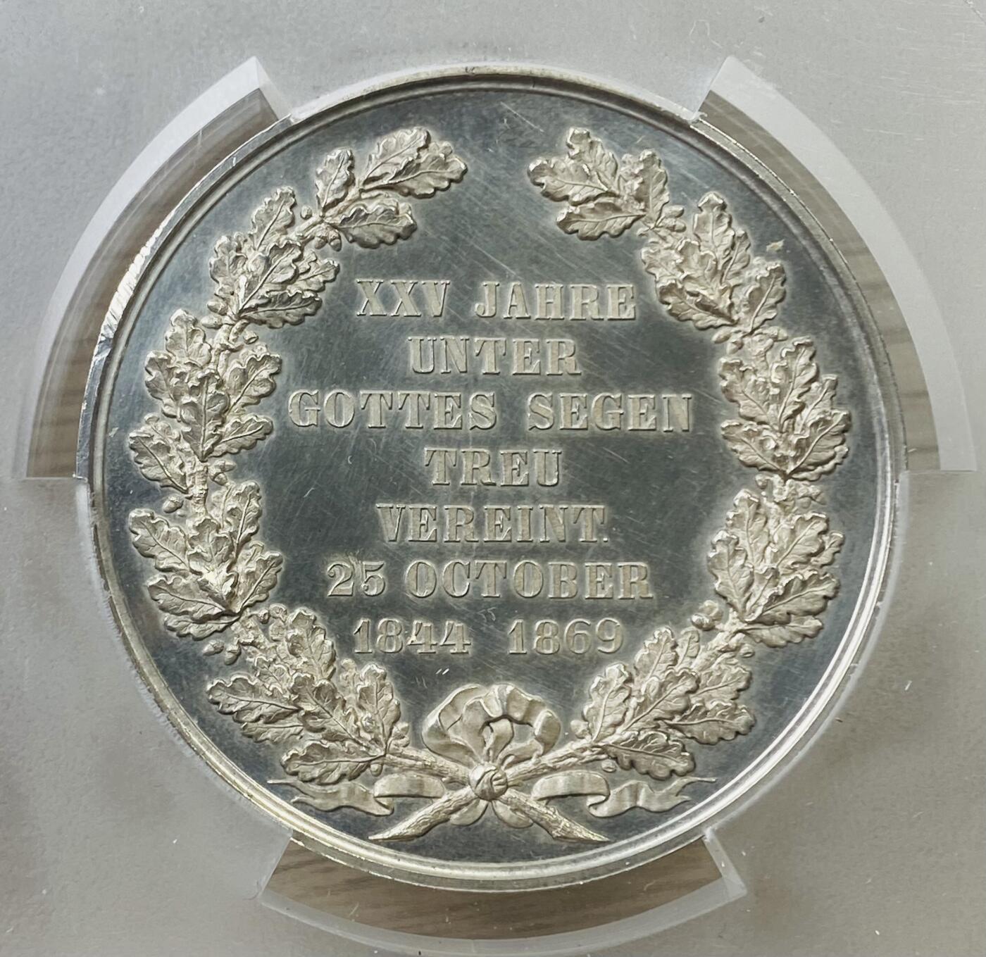 万国钱币拍卖第042期（蛇年首拍） PCGS SP63 1869年德国绍姆堡-利普银婚纪念大银章 大规格47MM 整体深度镜面 天使小邦高浮雕