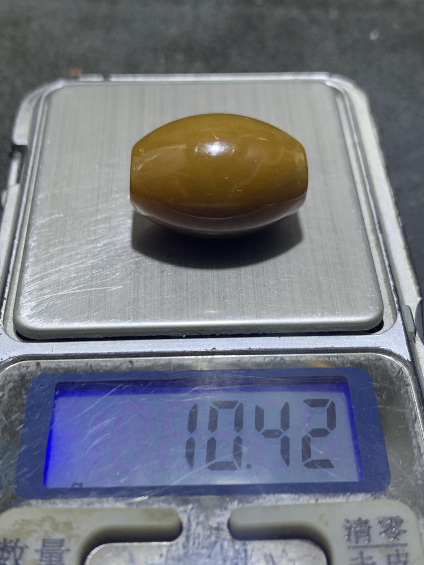 精美黄冻料战国红玛瑙桶珠一颗！