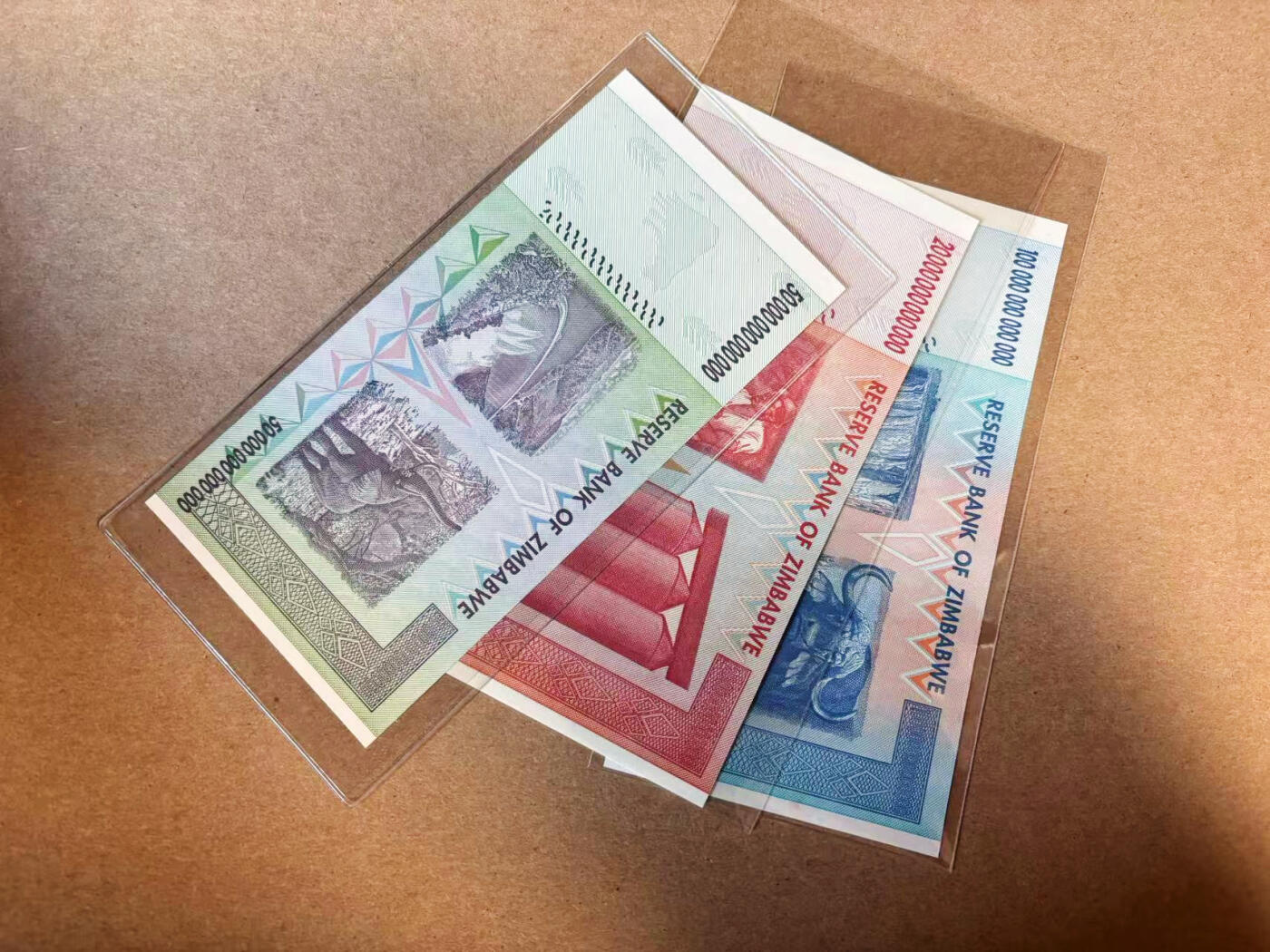 【Blue Auction】✨世界纸币精拍第618期【精】 【一组3张AA及补号ZA】津巴布韦20万亿-100万亿元 UNC/UNC-（100万亿有黄点）