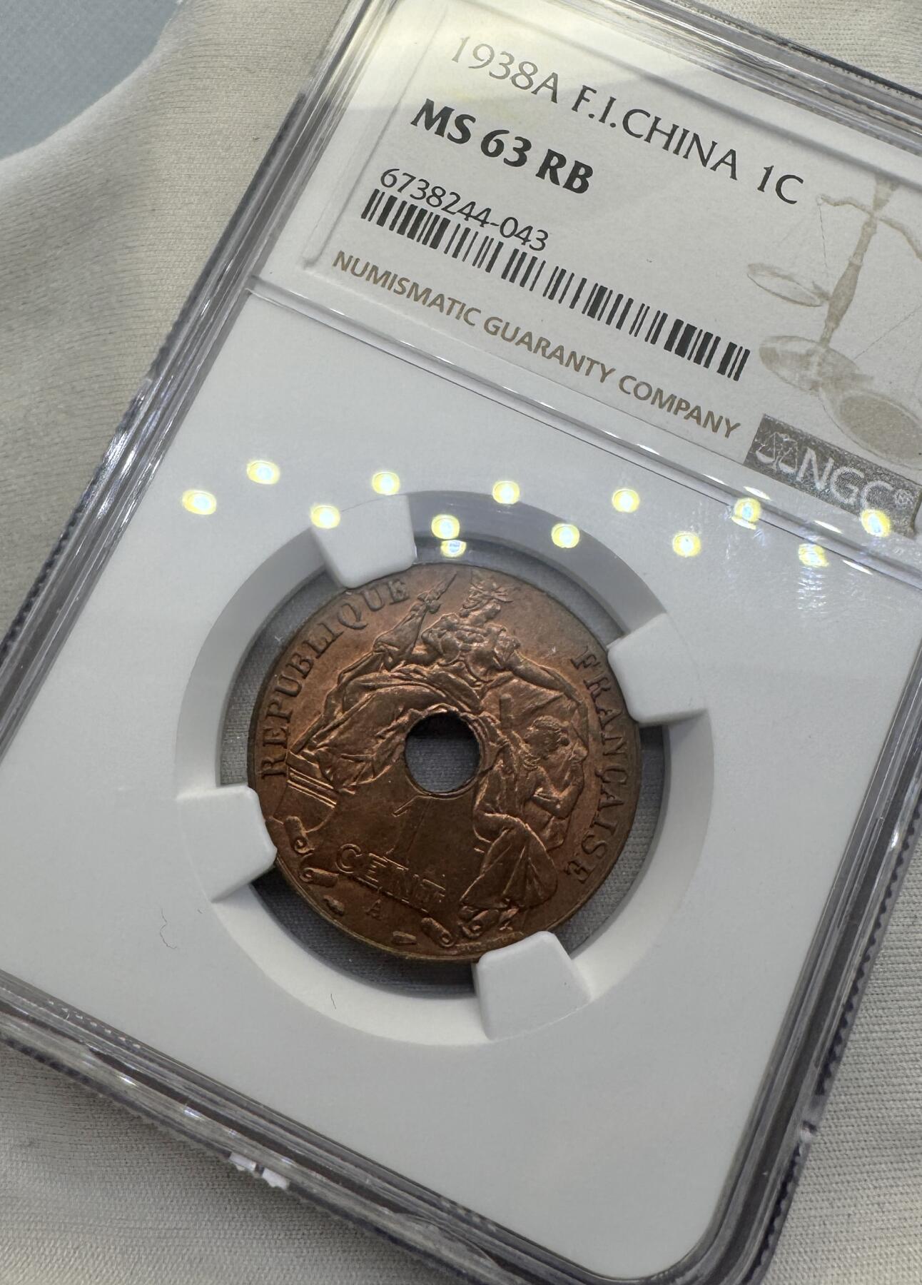 “一元初始，万象更新”新年新铺开张（第4期）新年第一拍 NGC-MS63RB 法属印度支那1938A百分之一铜币，品相与64无异，被包浆盖住了部分铜光