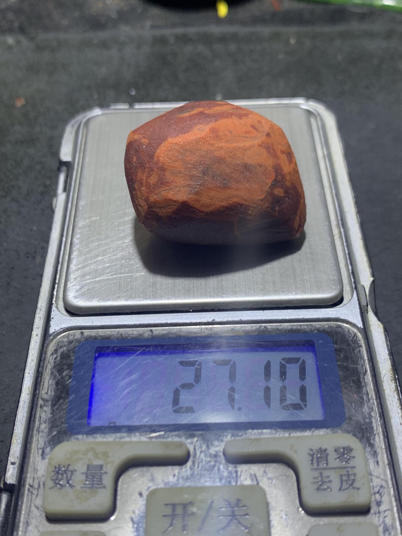 精美带皮冰飘柿子红南红玛瑙明料原石一颗