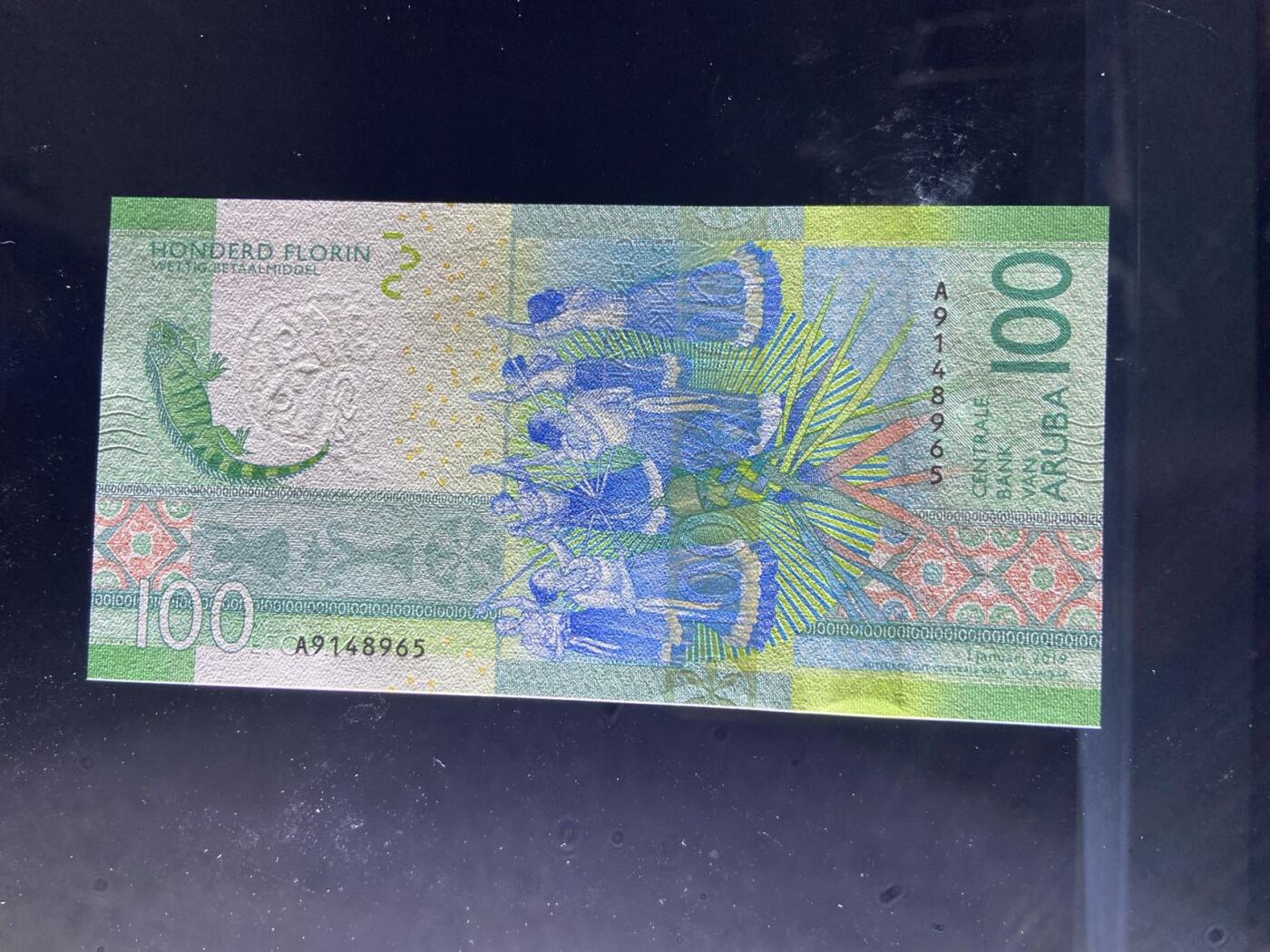 【炜奕收藏】，第二十五期，年后第一期 阿鲁巴100佛洛林，UNC品相，获奖钞