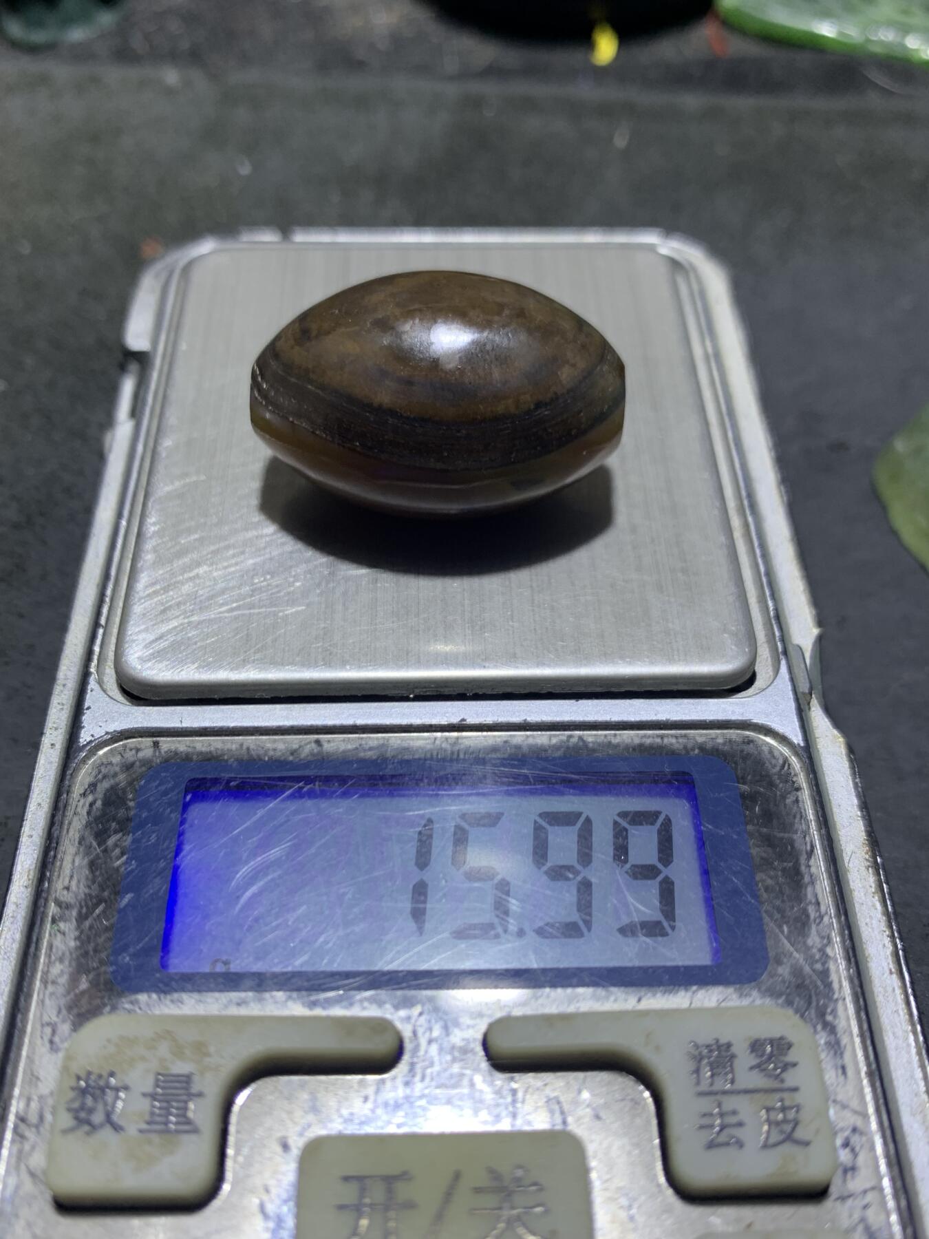 精美高玉化战国红玛瑙原皮天眼桶珠一个