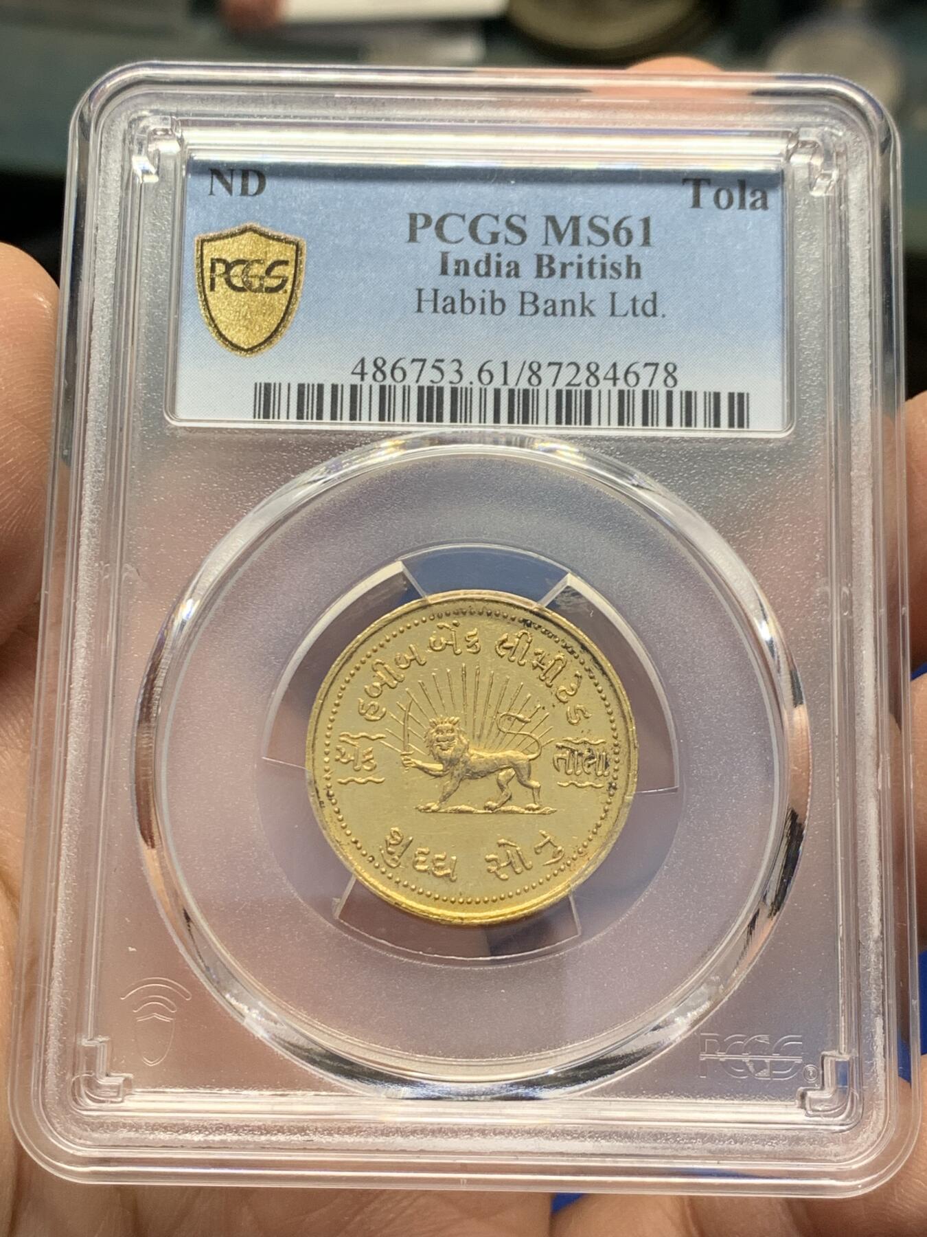 《竞宝斋》第353场 周日，周一，周二 3场连拍 （全场包邮） PCGS MS61 印度1940哈比卜银行1托拉金质代币，狮子拿刀图，约11.67克，当年的黄金投资标的，低估品种
