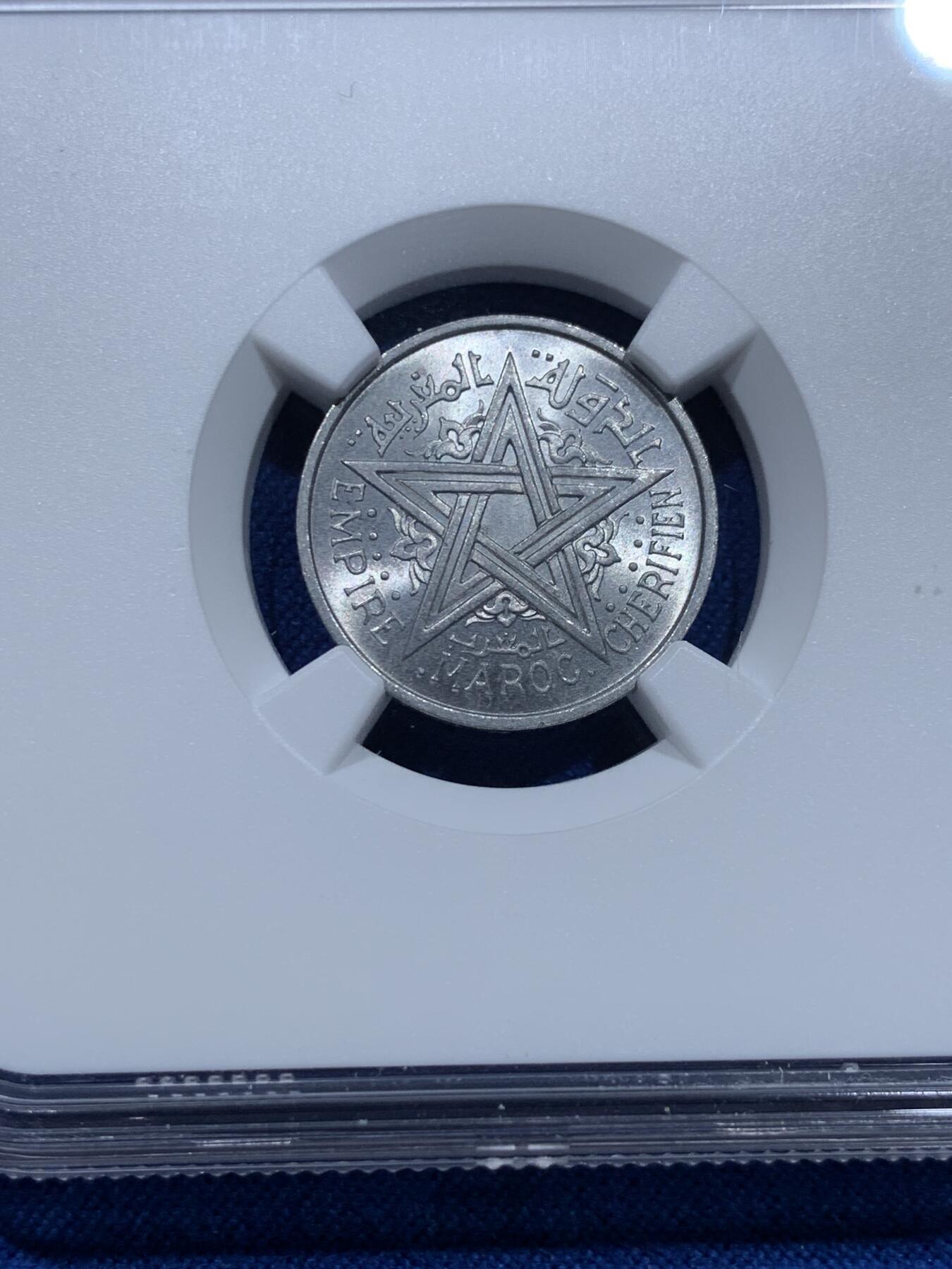 《竞宝斋》第353场 周日，周一，周二 3场连拍 （全场包邮） NGC MS66 法属摩洛哥1951年1法郎，拆卷评级高分，铝币出高分不容易，收藏级！亚军分，更高分仅1枚！