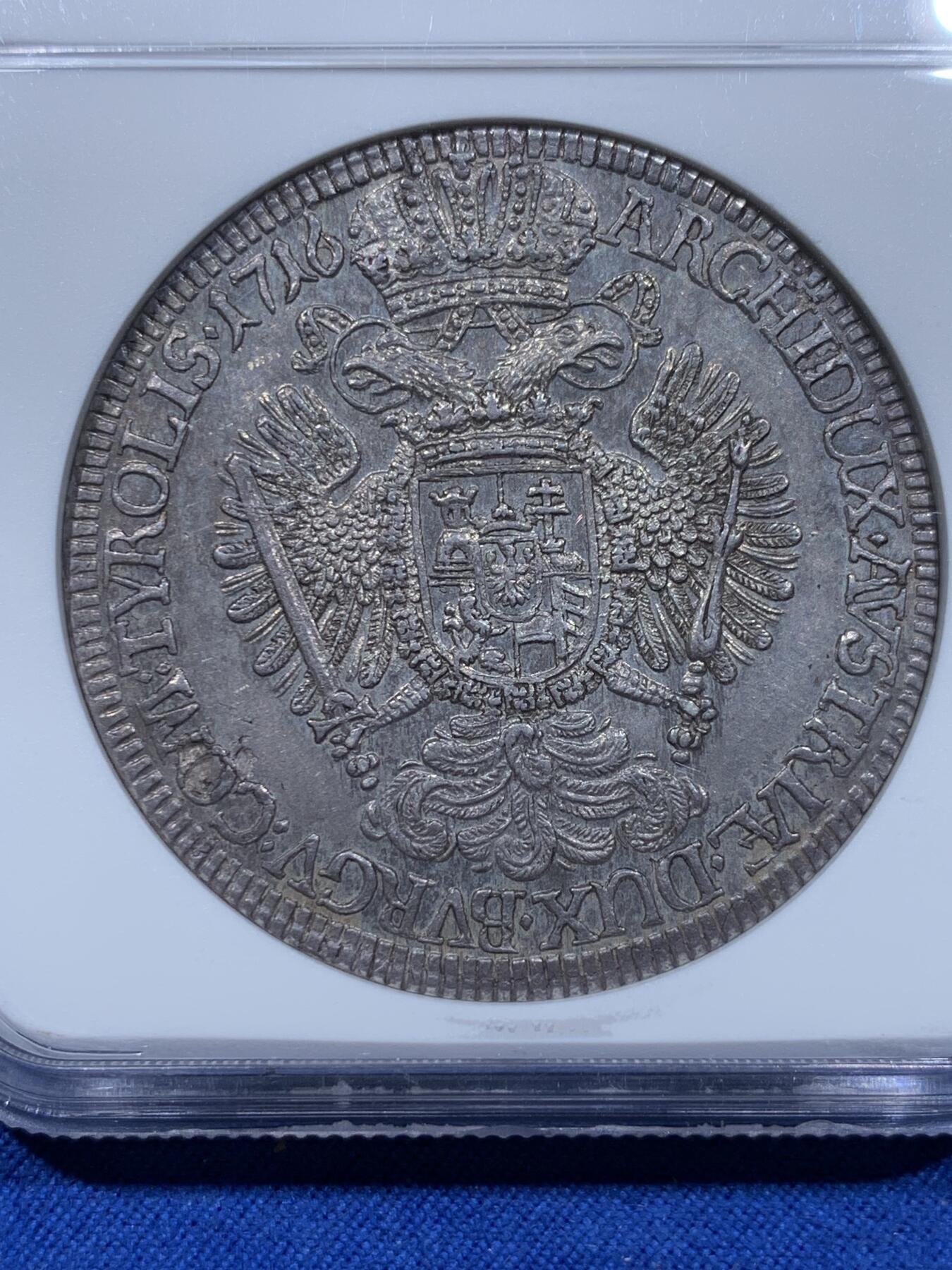 《竞宝斋》第354场 周日，周一，周二 3场连拍 （全场包邮） NGC MS62 冠军分 神圣罗马帝国1716/5骑字泰勒大银币，神罗总庭。少见卡尔六世年轻头像，大卷毛。双面深打，发丝鹰羽细节纤毫毕现，卓绝冠军品质