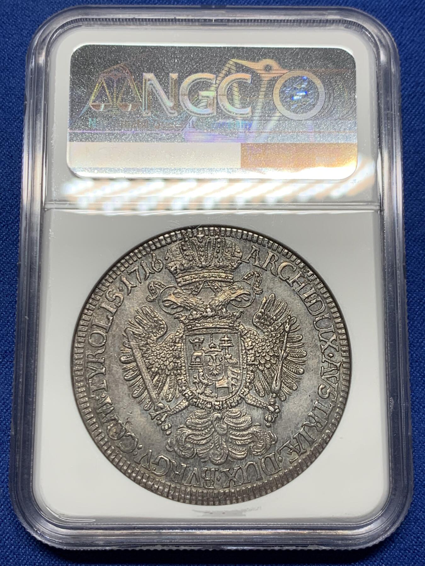 《竞宝斋》第354场 周日，周一，周二 3场连拍 （全场包邮） NGC MS62 冠军分 神圣罗马帝国1716/5骑字泰勒大银币，神罗总庭。少见卡尔六世年轻头像，大卷毛。双面深打，发丝鹰羽细节纤毫毕现，卓绝冠军品质