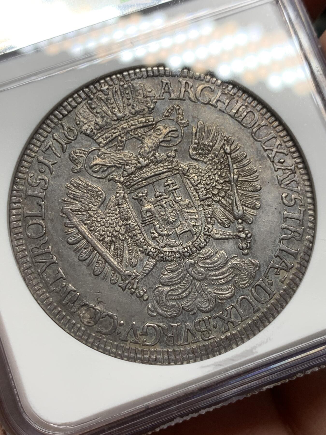 《竞宝斋》第354场 周日，周一，周二 3场连拍 （全场包邮） NGC MS62 冠军分 神圣罗马帝国1716/5骑字泰勒大银币，神罗总庭。少见卡尔六世年轻头像，大卷毛。双面深打，发丝鹰羽细节纤毫毕现，卓绝冠军品质