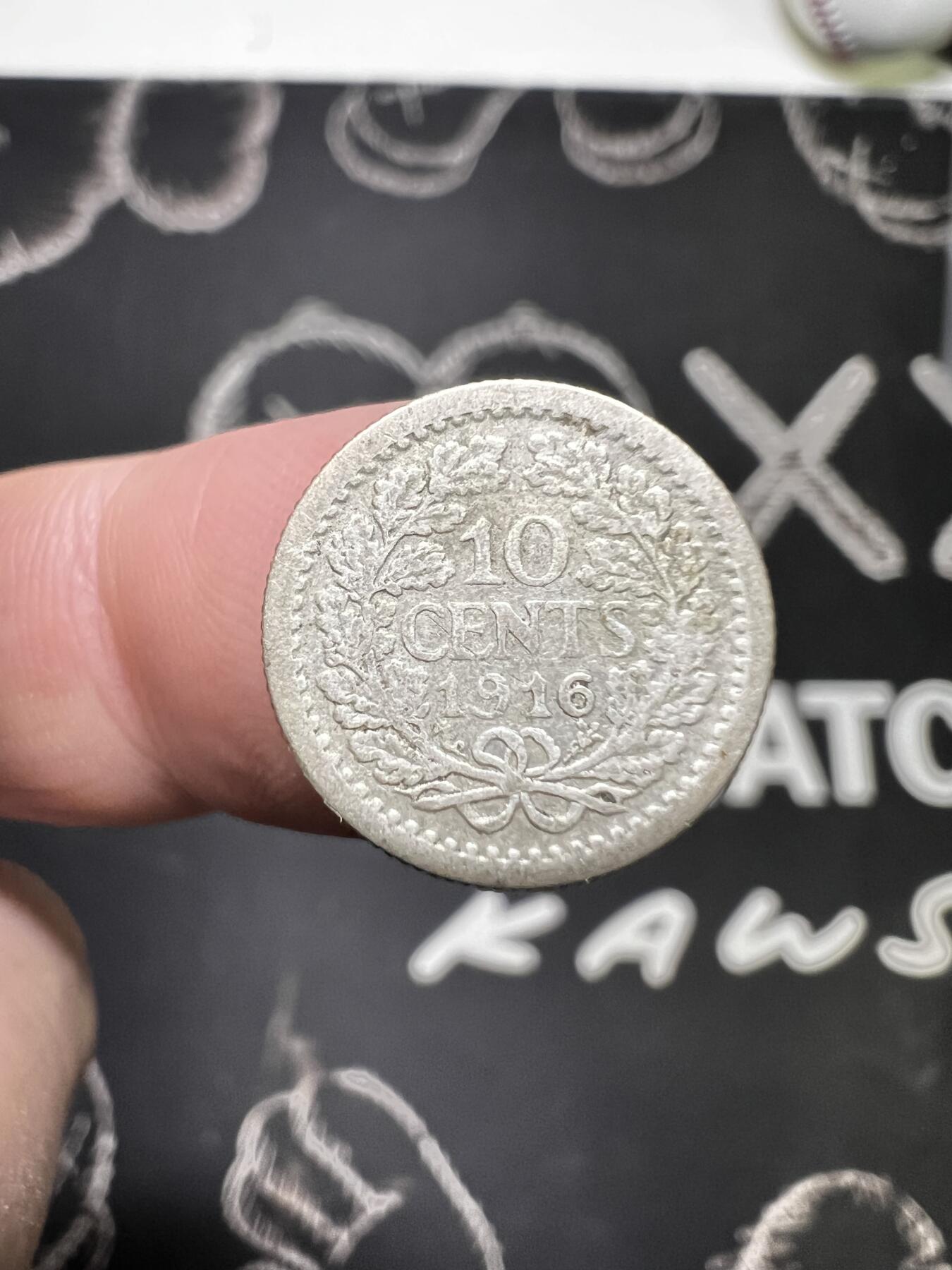 聚福钱庄~世界钱币第一期 新店开业 全场包邮 欢迎参拍 荷兰1916年威廉明娜10分银币  很少见