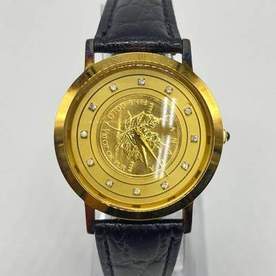 【海寕潮】拍卖第146期【长期征集拍品】 -  【海宁潮】加拿大1/10盎司枫叶金币加镶嵌天然钻石，皮表带手表，背面表盖为925银材质。金币材料价2145元左右，还有背面银壳材料价格也要2200左右了，手表需要换电池，展示架只作为展示