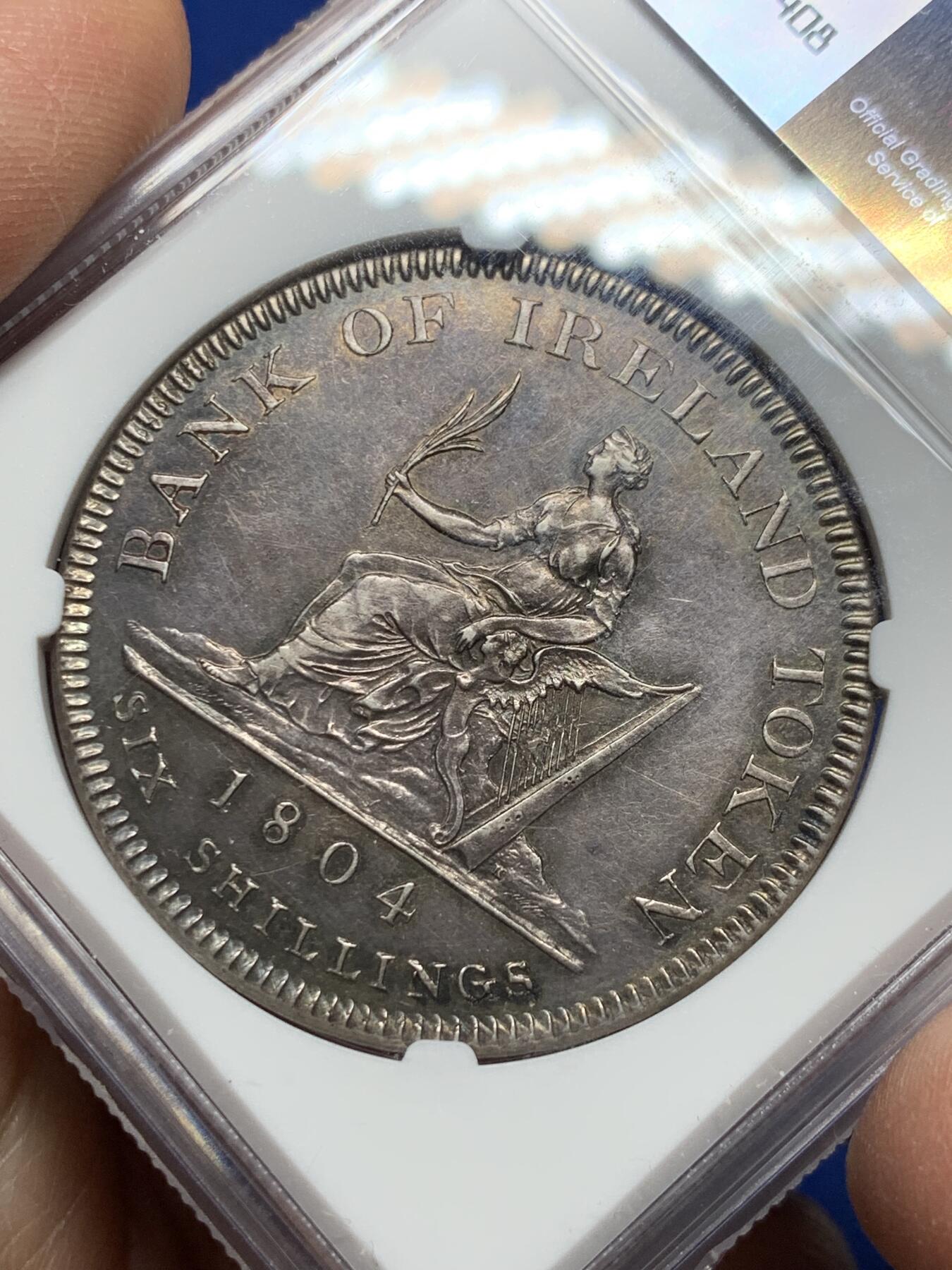 《竞宝斋》第356场 周日，周一  2场连拍 （全场包邮） NGC AUD 英国1804乔治三世爱尔兰银行6先令银质代币 非常少见的爱尔兰版本