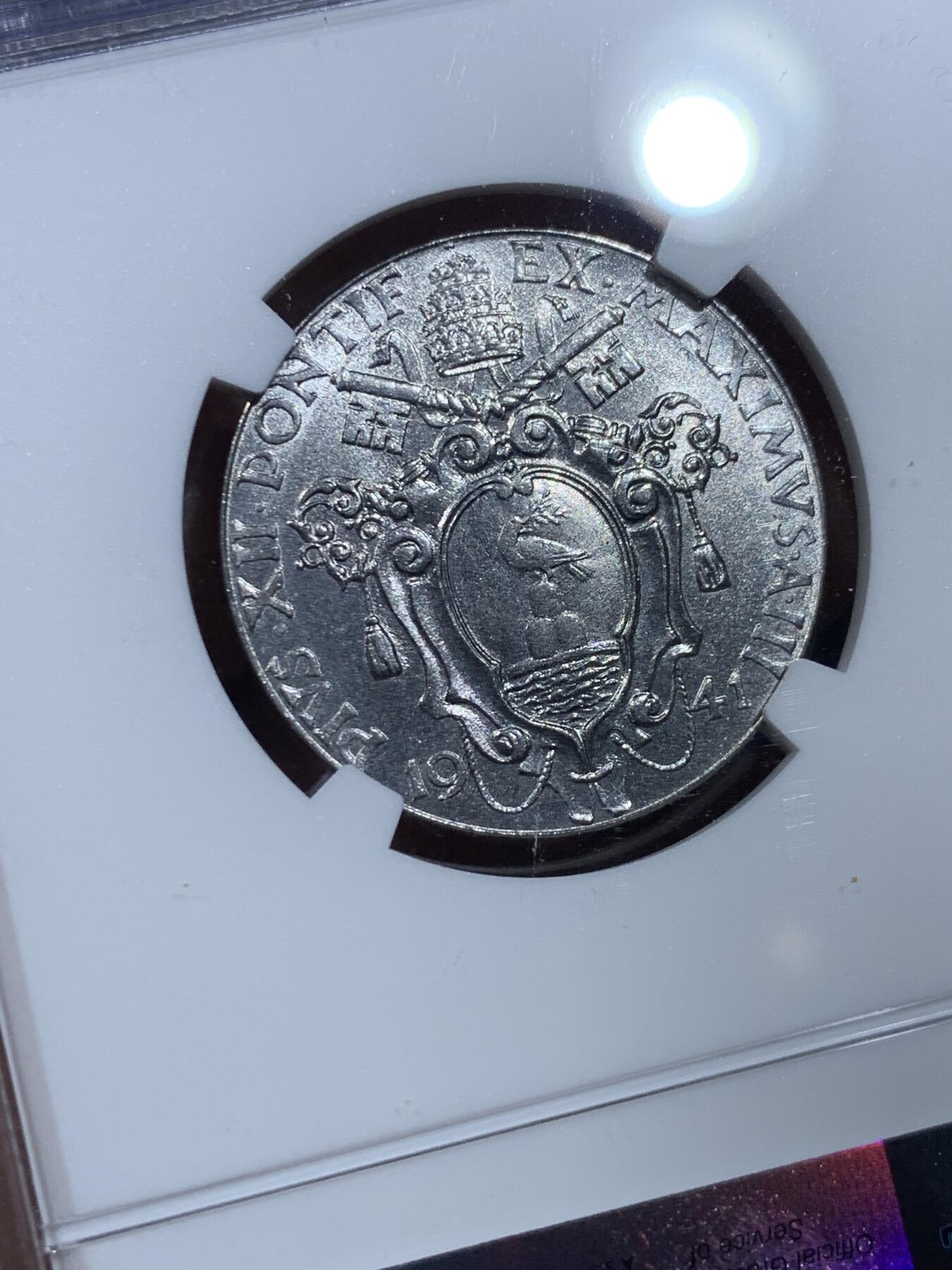 《竞宝斋》第356场 周日，周一  2场连拍 （全场包邮） NGC MS64 梵蒂冈1941年1里拉 两面转光 细节清晰 80多年的东西 保存成这样很不容易了 可藏