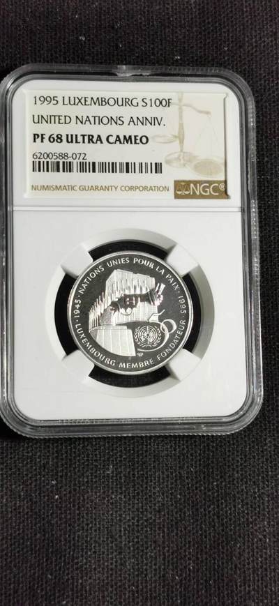 刘世昌艺术品销售中心～虎踞龙蟠*金杨在线联拍群第508期 - 卢森堡1995年“联合国50周年”100法郎精制银币（NGC   PF68UC   串号：6200588-072）1枚。